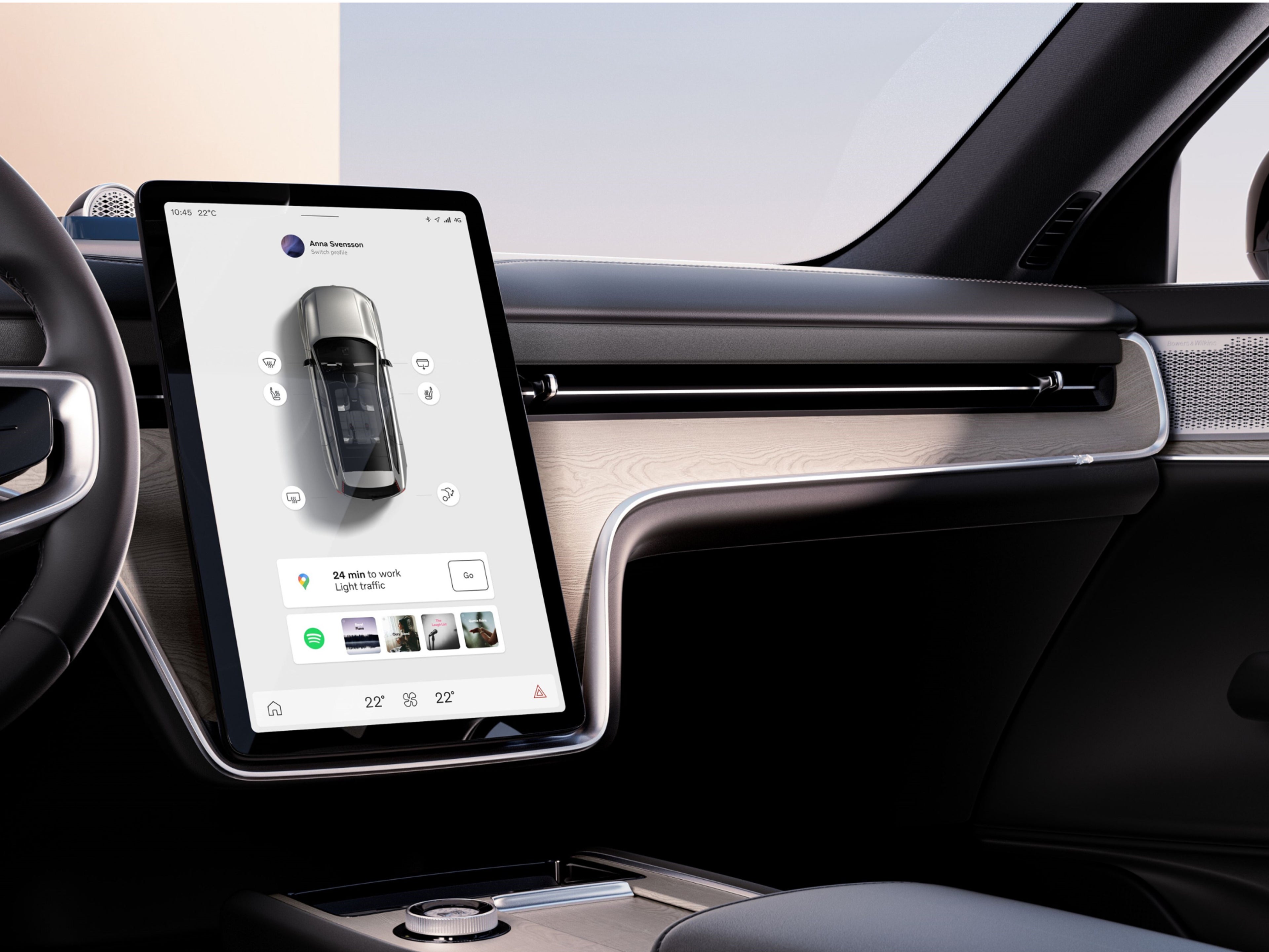 An inside view of a Volvo car's dashboard with information shown on the in-car entertainment system.