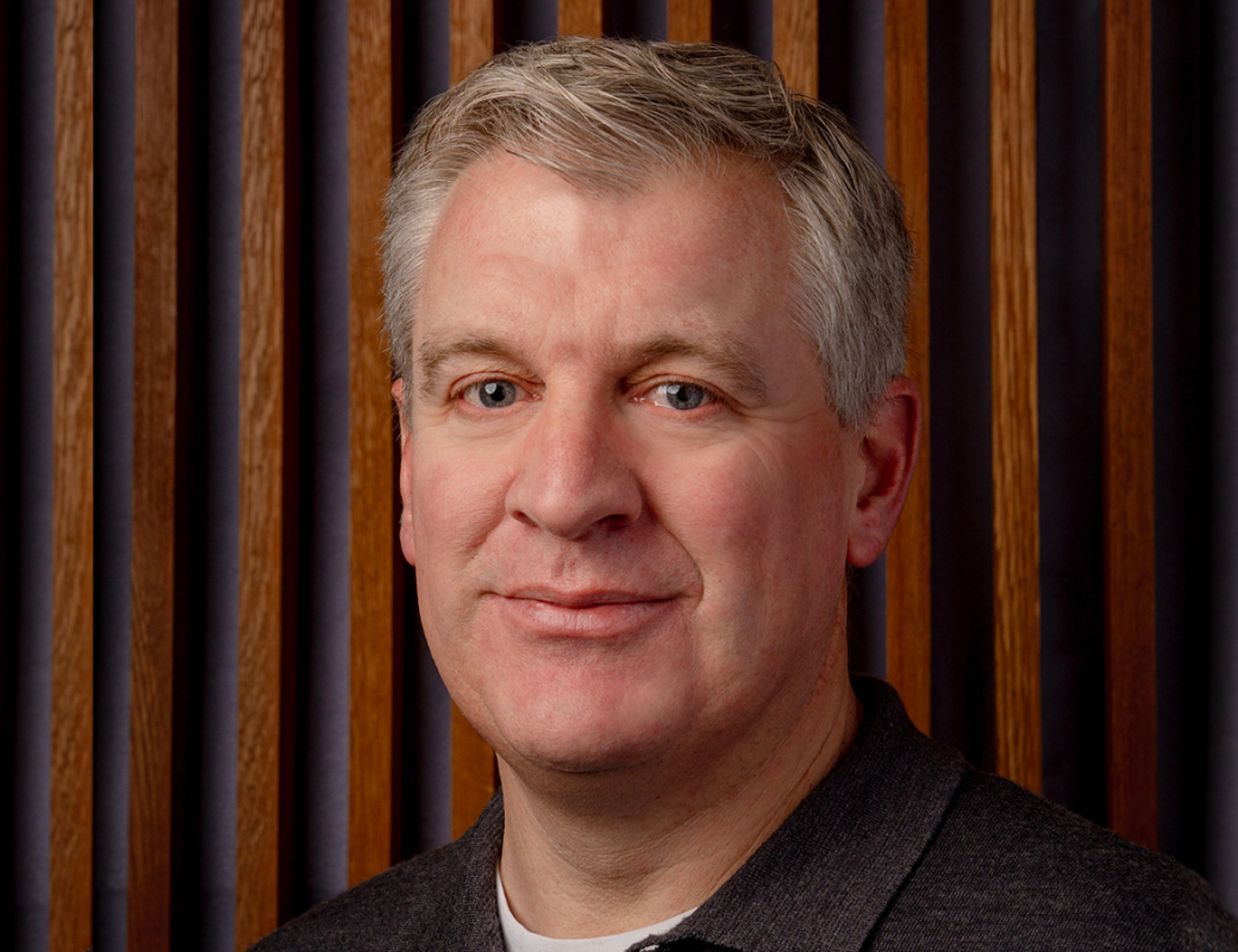 A portrait photo of a man.