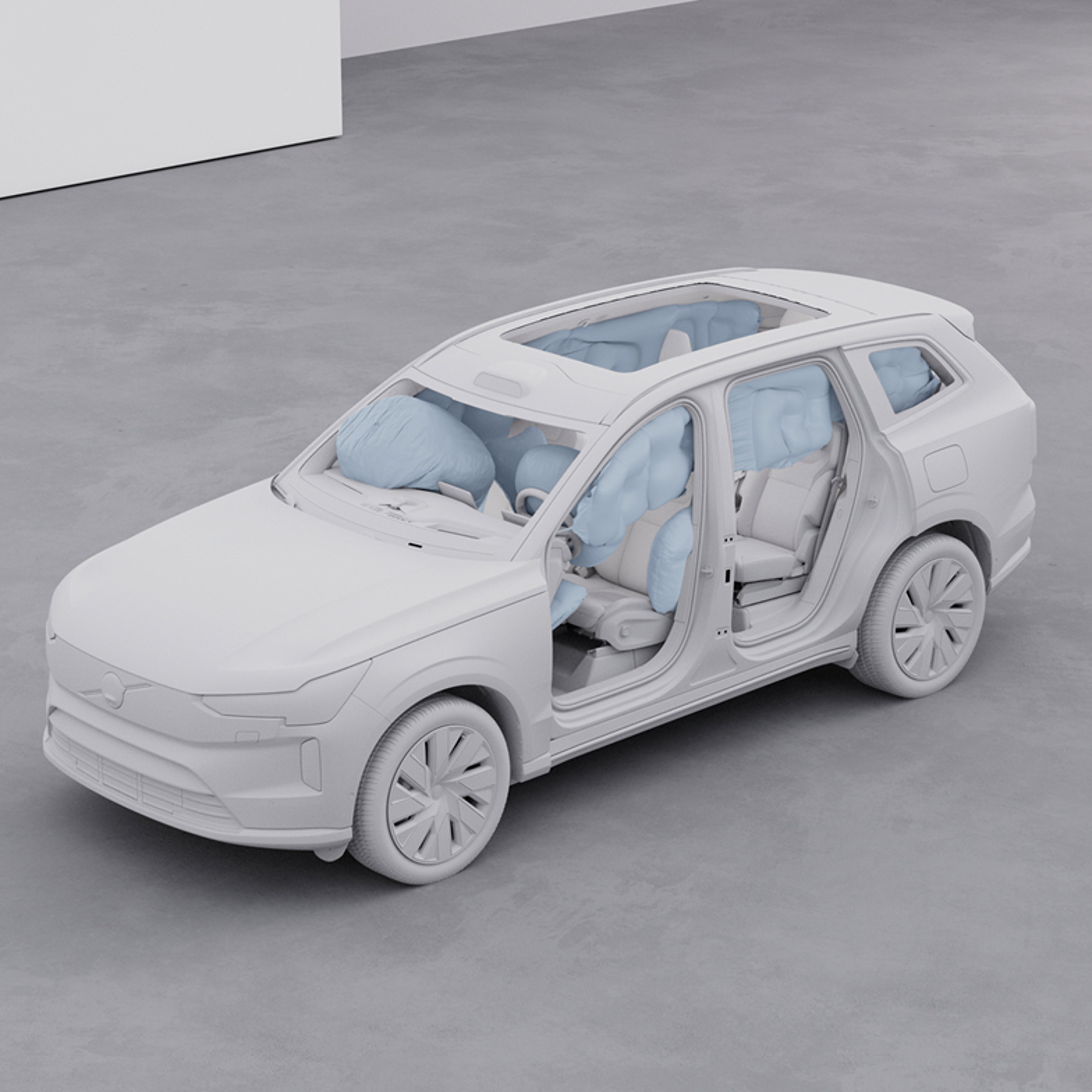 Wizualizacja z gliny przedstawiająca widok z góry na SUV-a Volvo z aktywowanymi poduszkami powietrznymi.