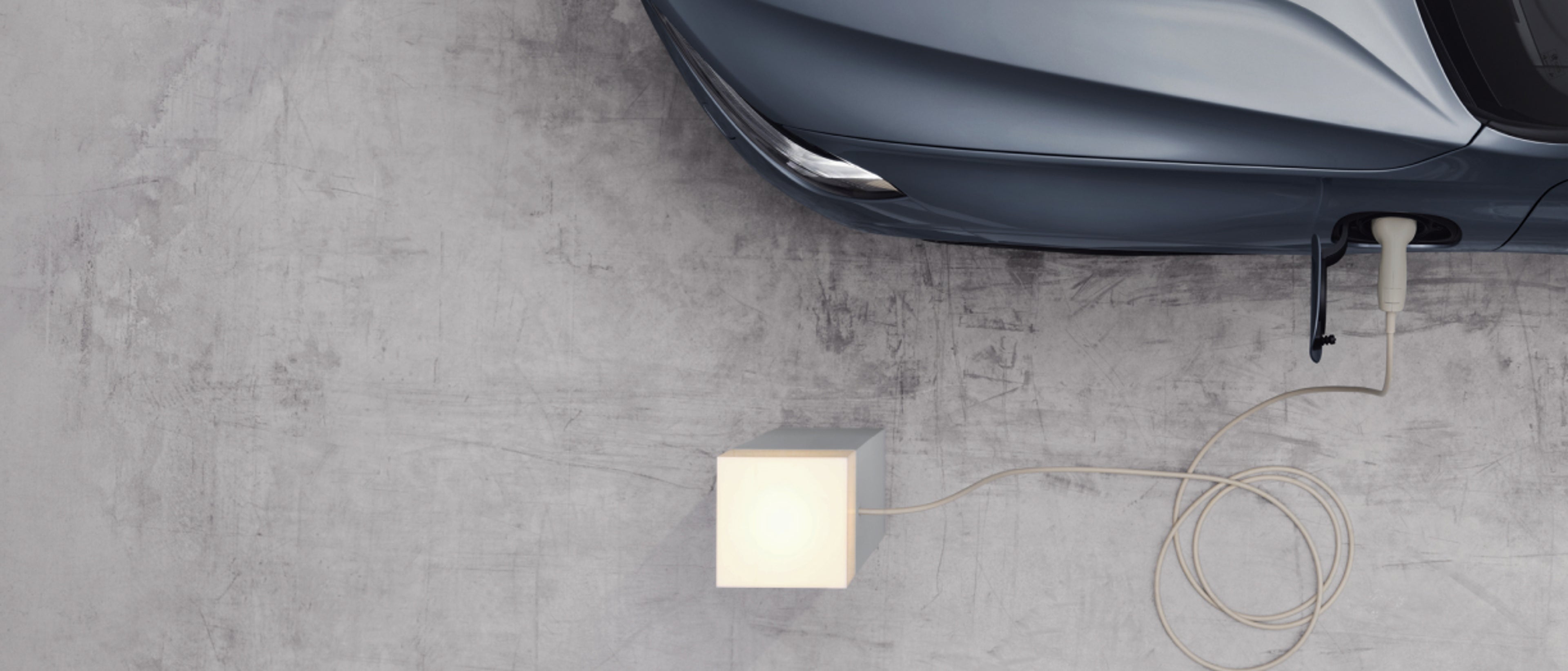 A partial front three-quarters shot of a Volvo car.