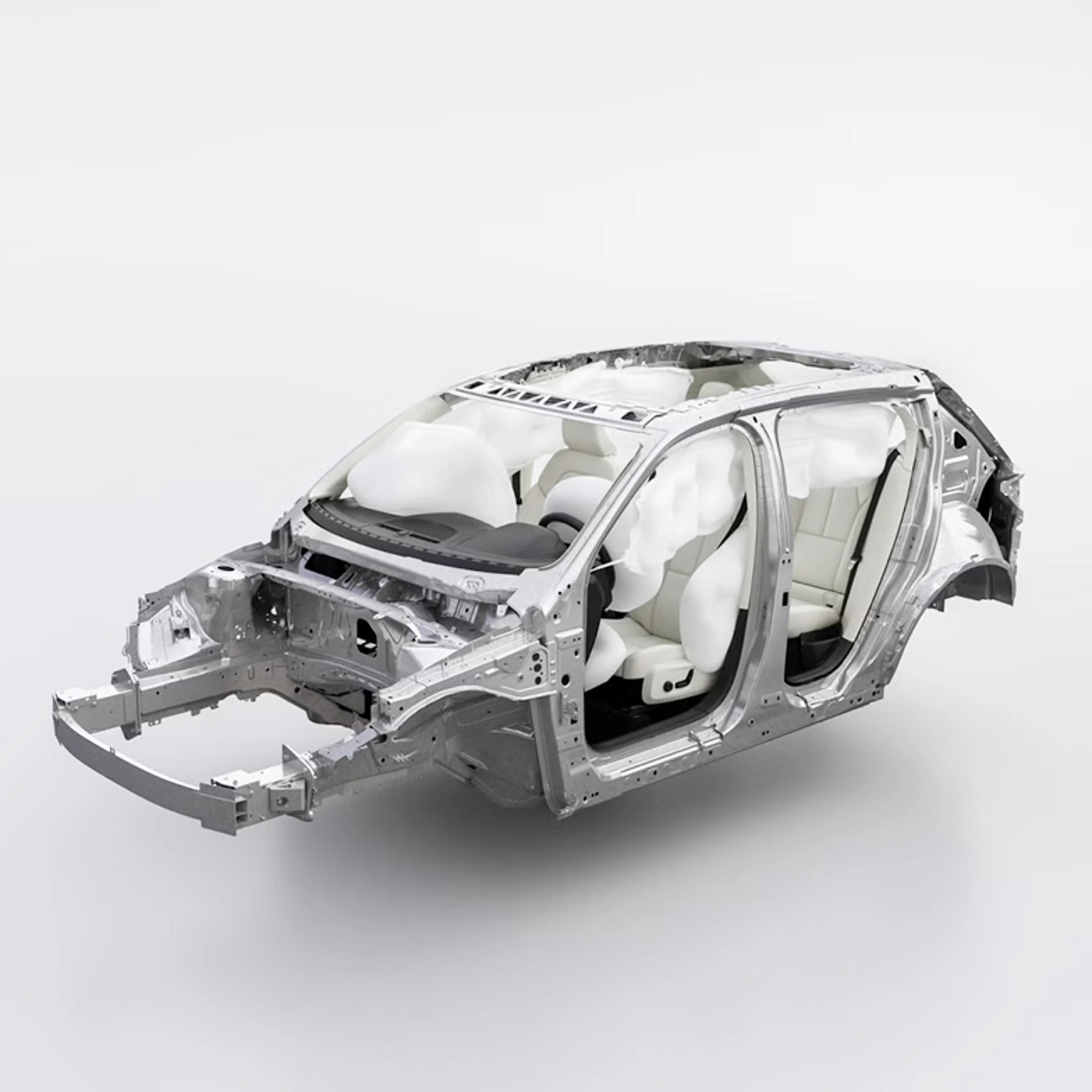 Exposed Volvo car frame showing airbags and high-strength steel safety cage.