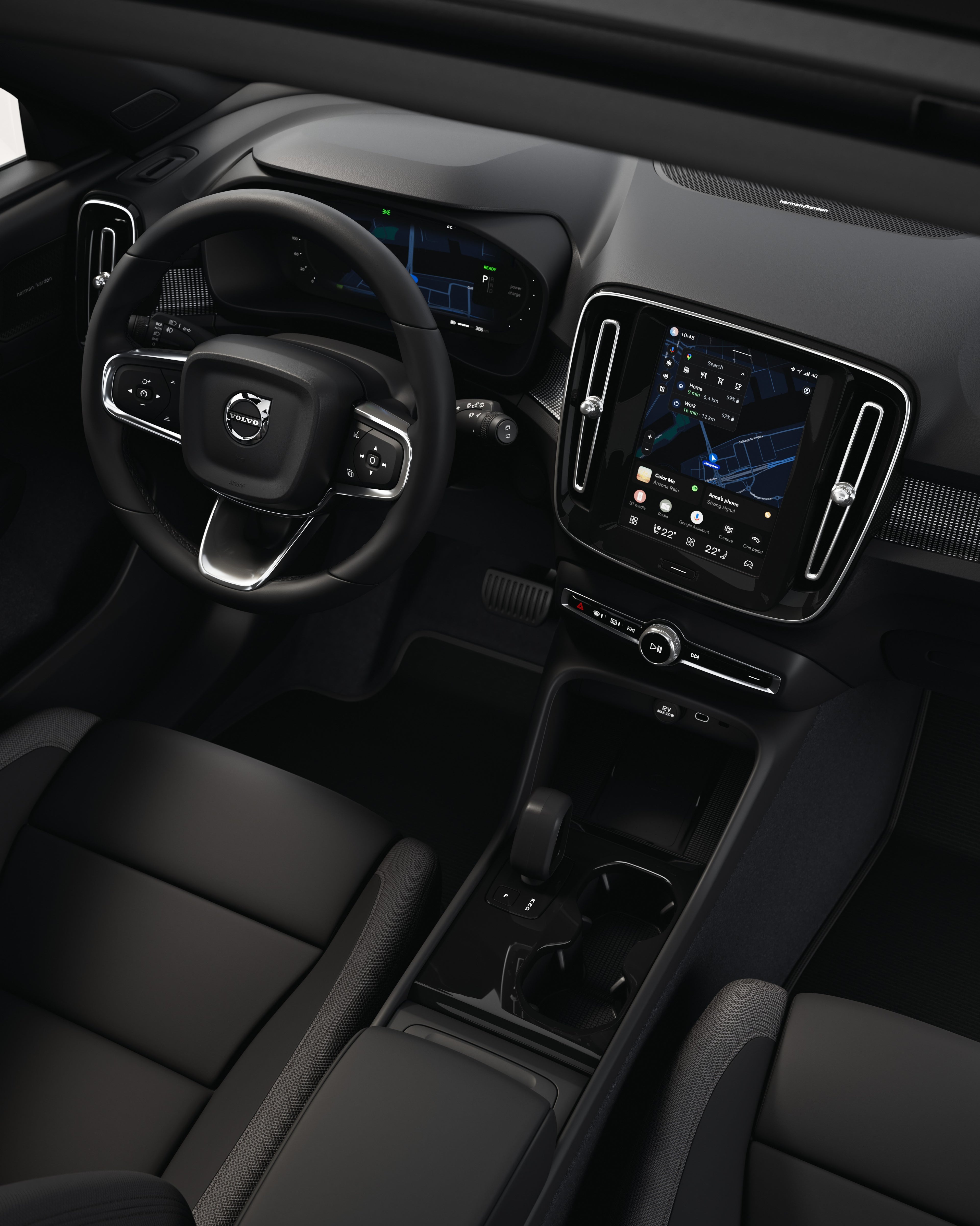 Interior of the Volvo EX40 with the steering wheel and central touchscreen display.