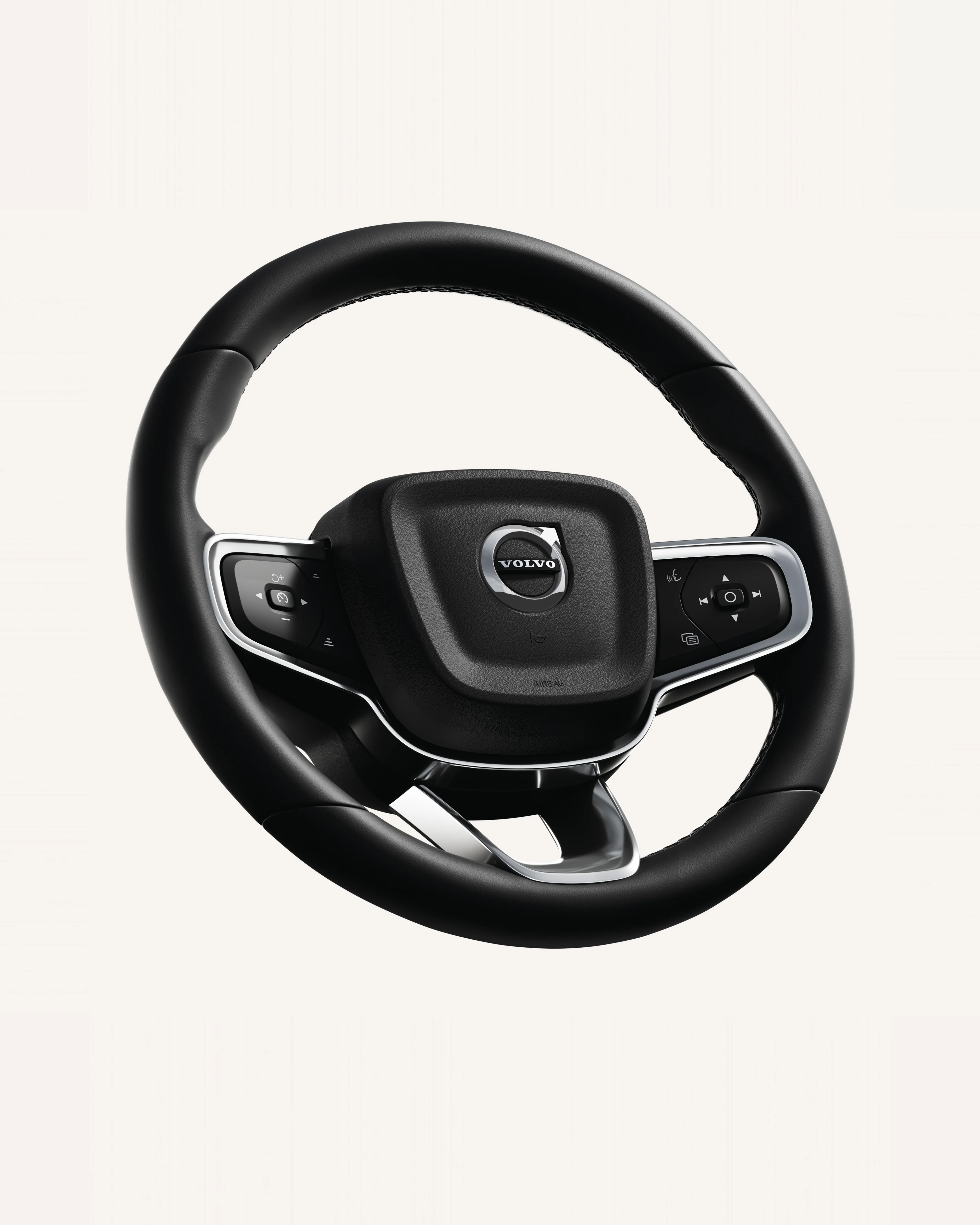 Close-up of the Volvo EX40 steering wheel, featuring integrated controls.