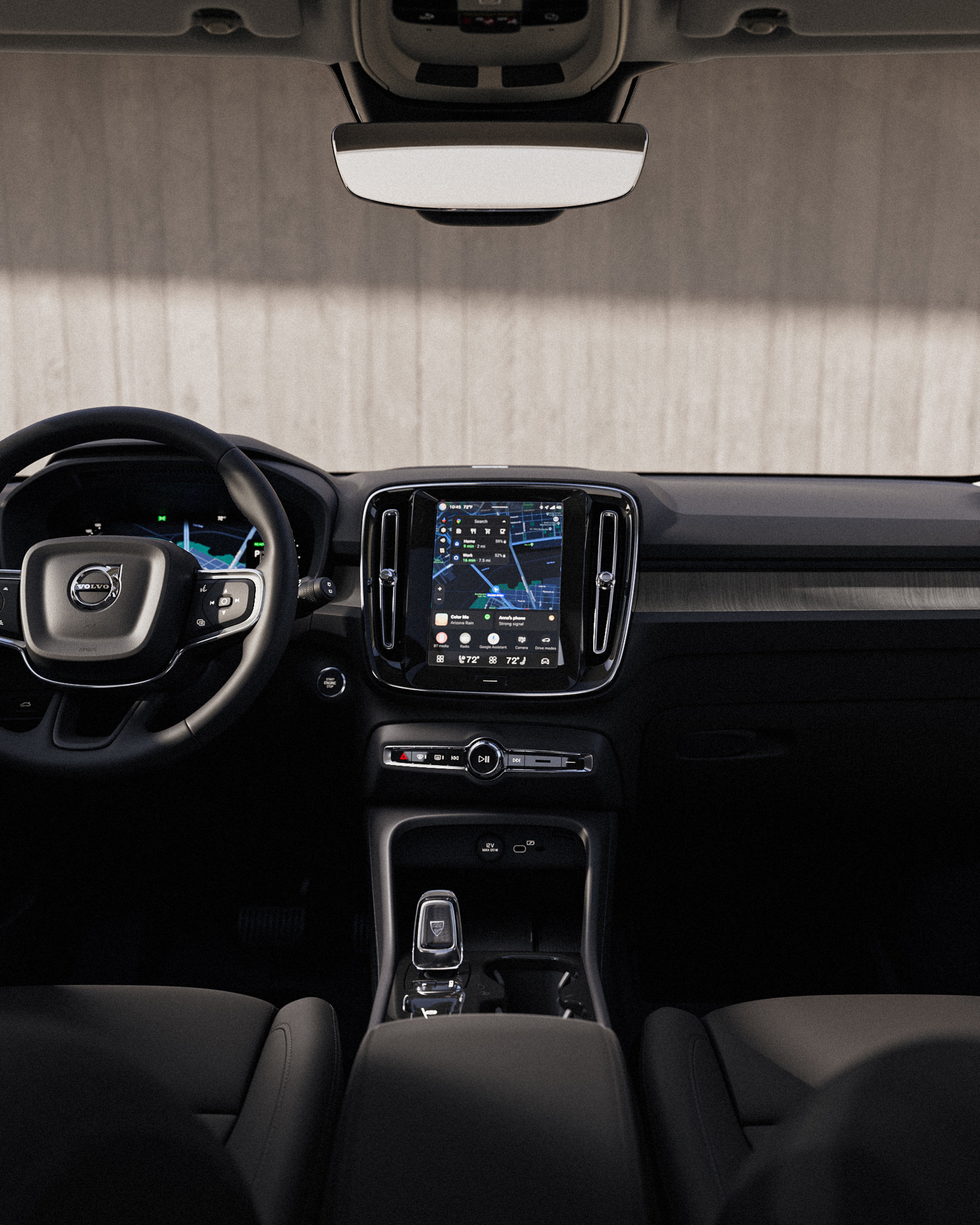 Interior view of the Volvo XC40 dashboard, including steering wheel and touchscreen.