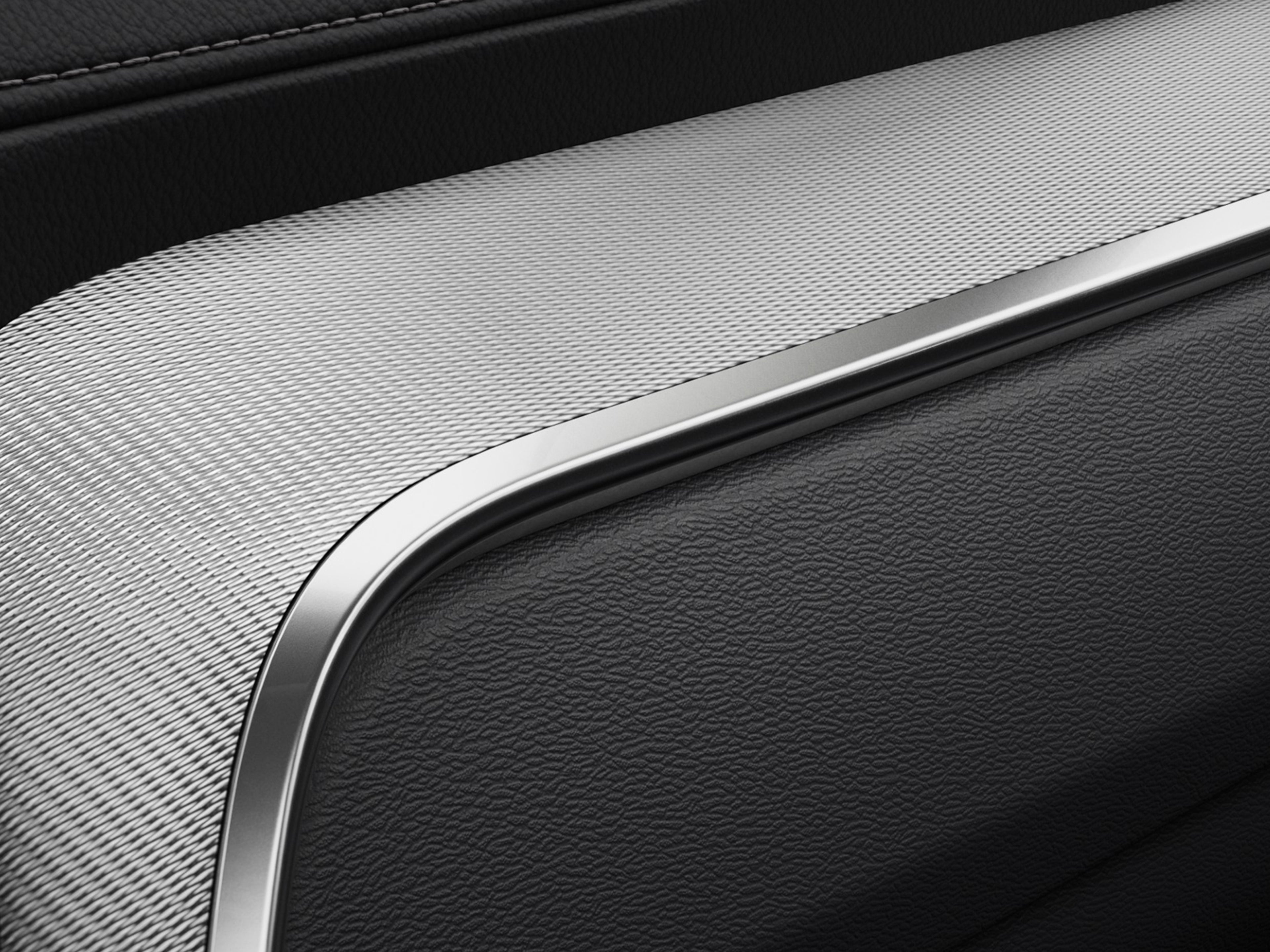 Metal mesh inlays and decor in Volvo S60 sedan.