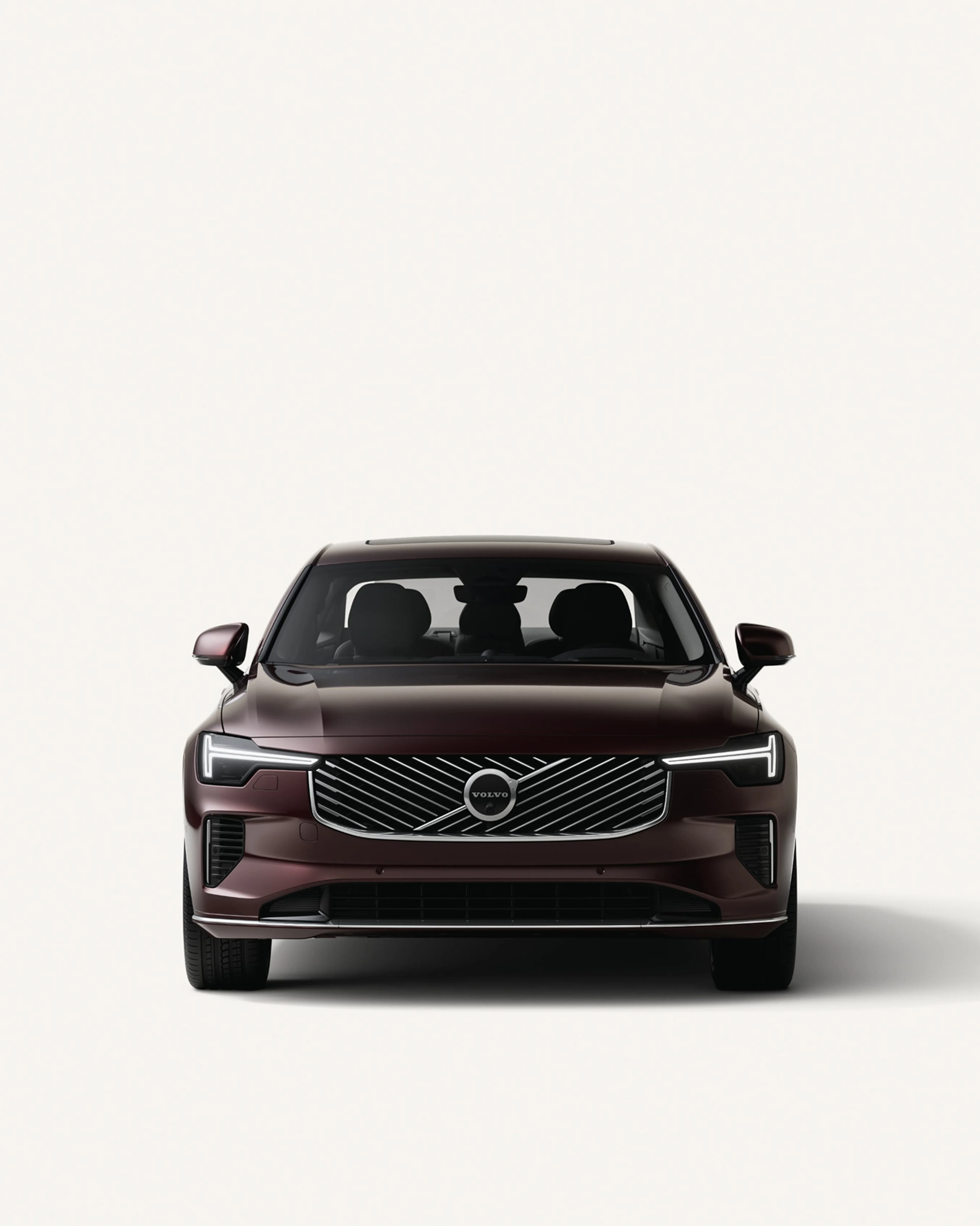 Front view of the Volvo S90 in a white studio environment.