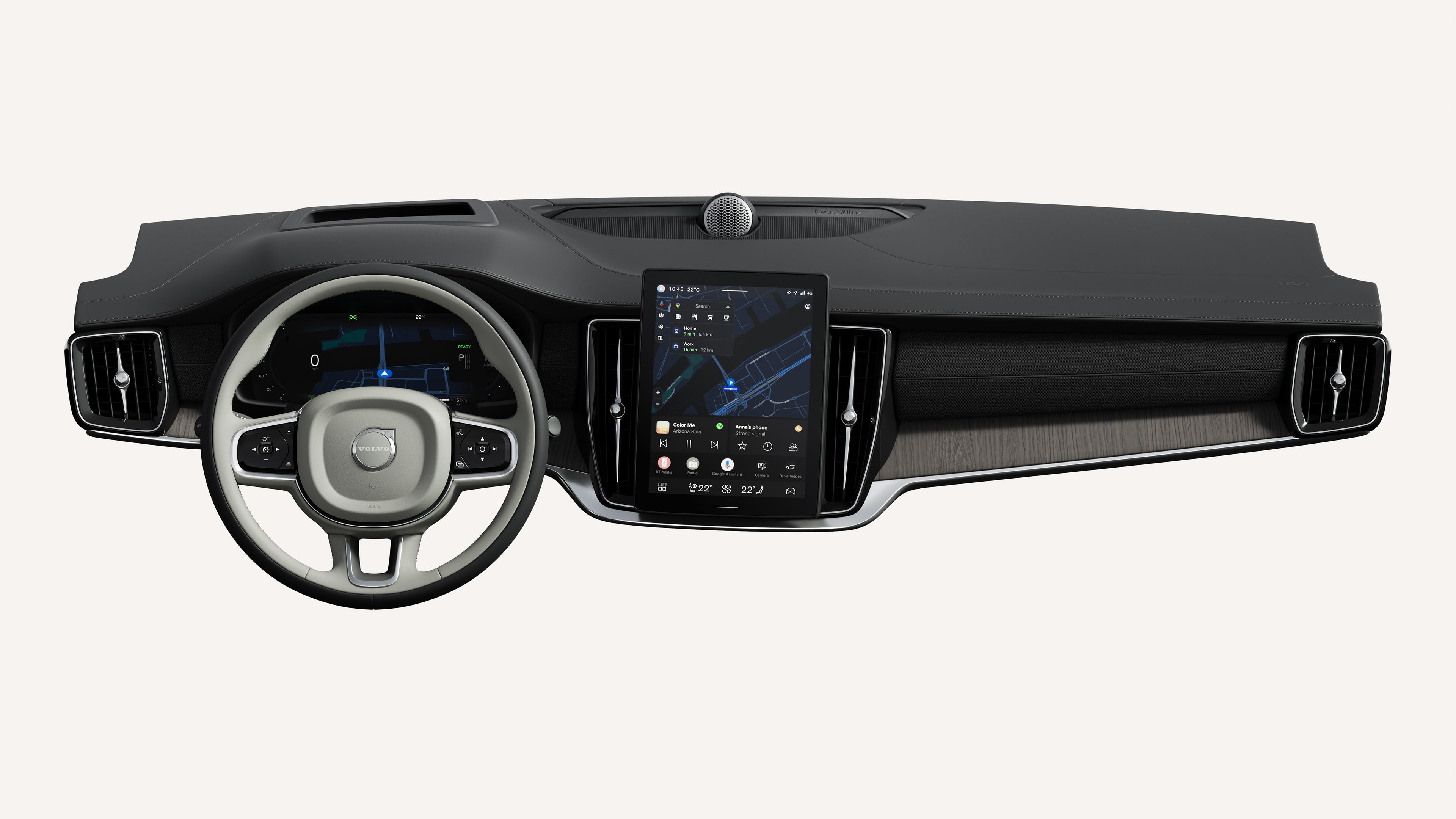 Interior view of the Volvo S90 dashboard, including steering wheel and touchscreen.