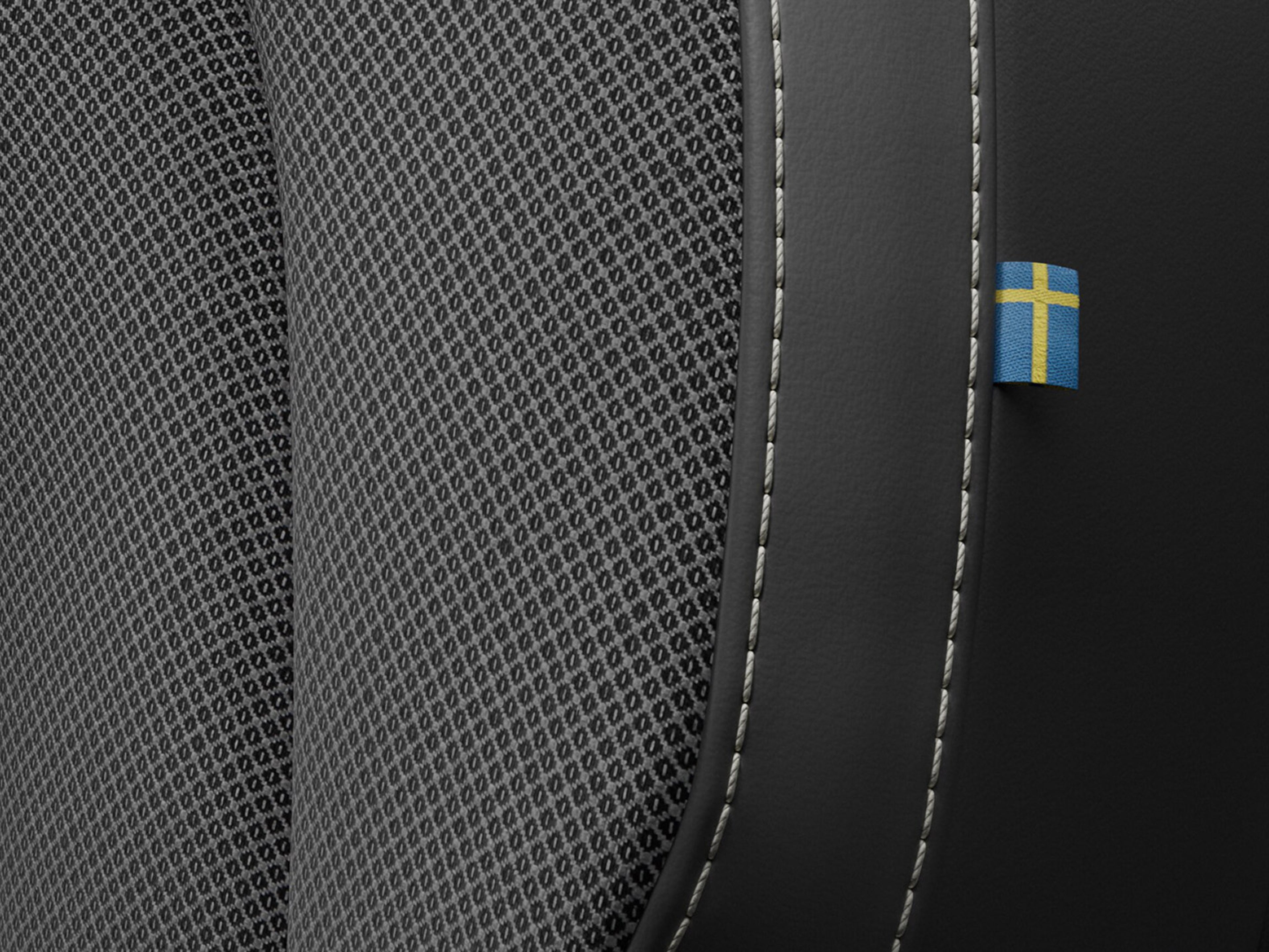 Interior close-up of the leather free Tailored Wool Blend seats in a Volvo S60 Recharge.