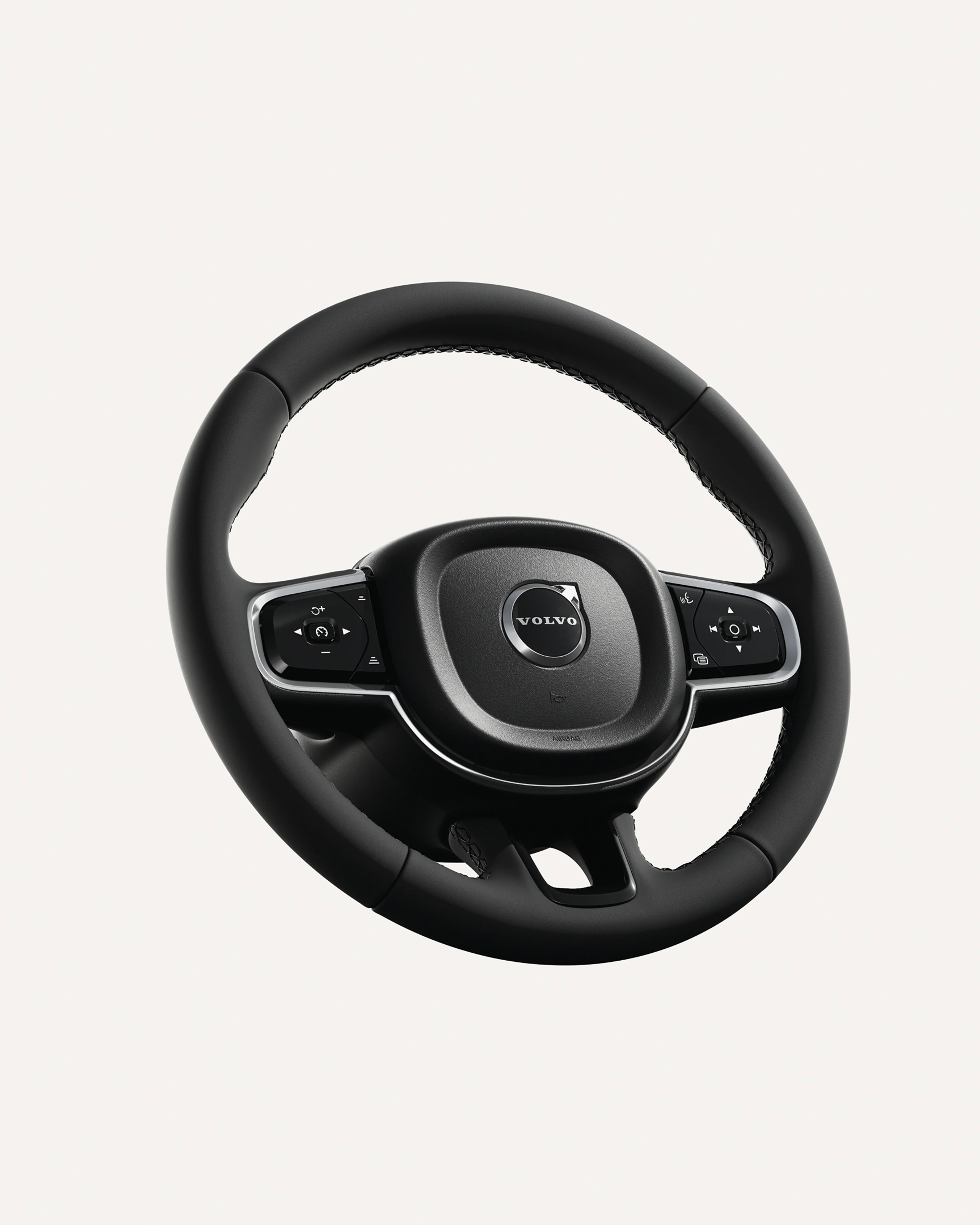 Nahaufnahme des Lenkrads des Volvo XC90 mit integrierten Bedienelementen