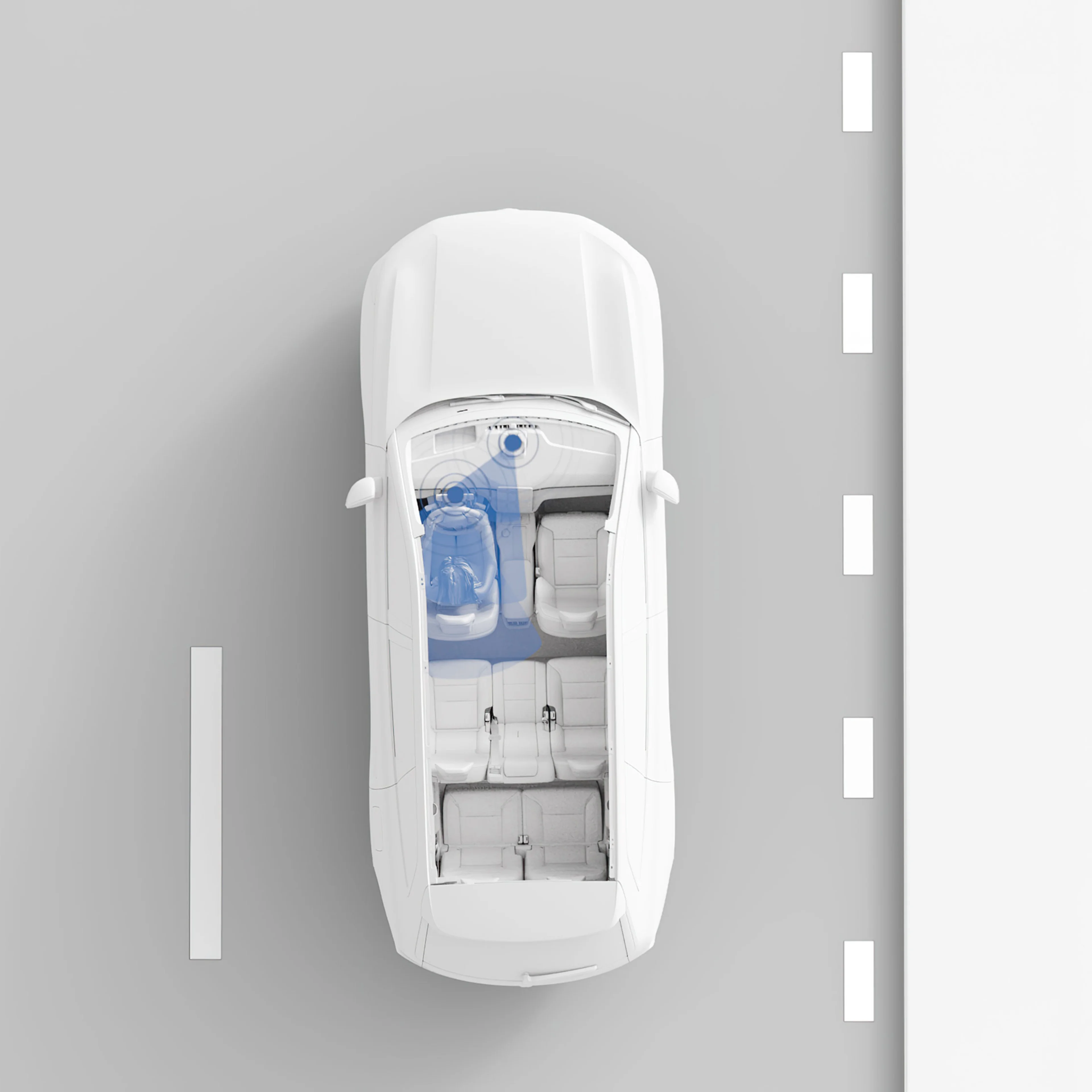 Vy uppifrån av en bil med blåmarkerat interiörområde som visar systemet för "Driver Understanding" i Volvo EX90.