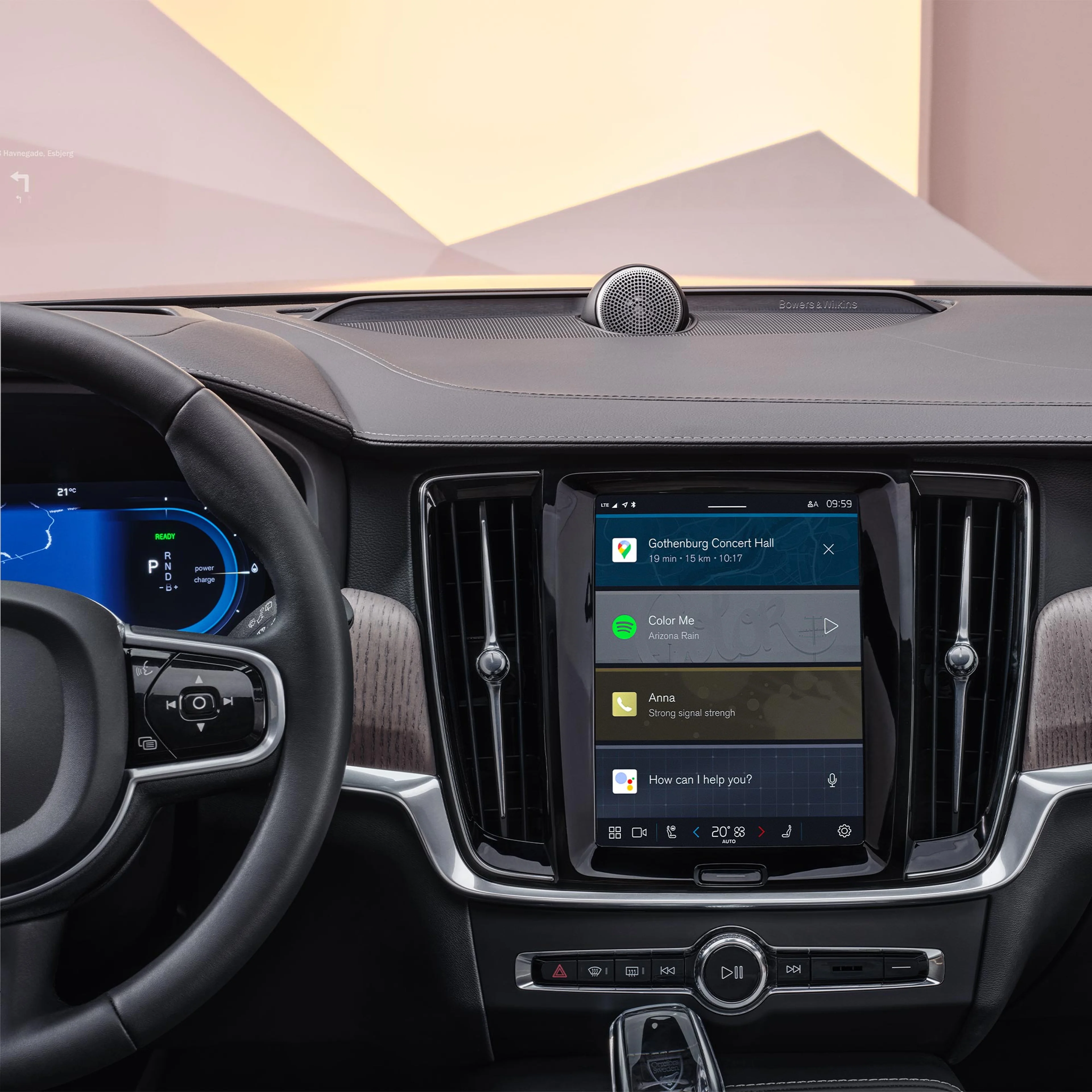 Volvo V90 driver view of steering wheel and center display.