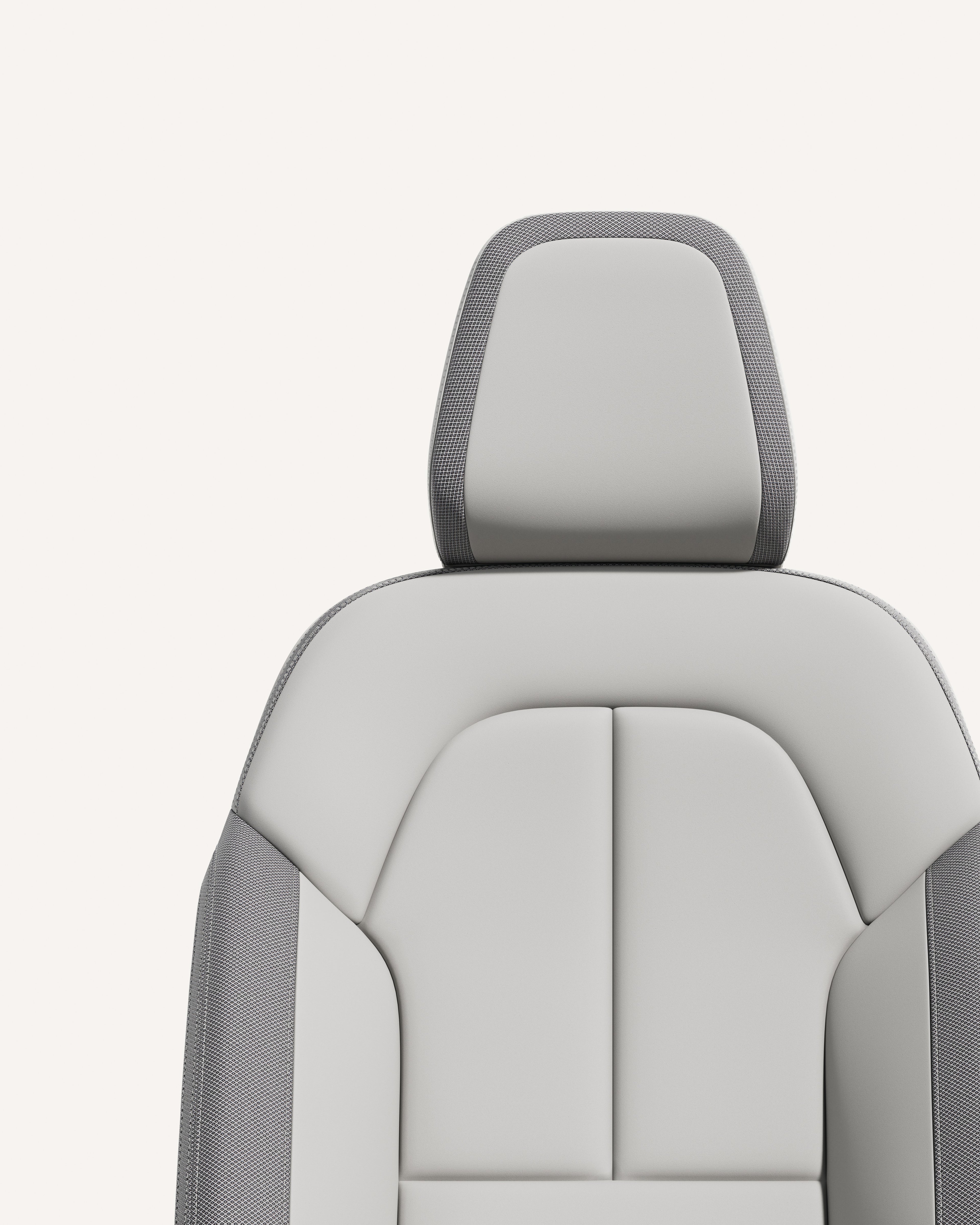 Volvo EC40 säte i materialet Dawn med ergonomisk design och slanka konturer.