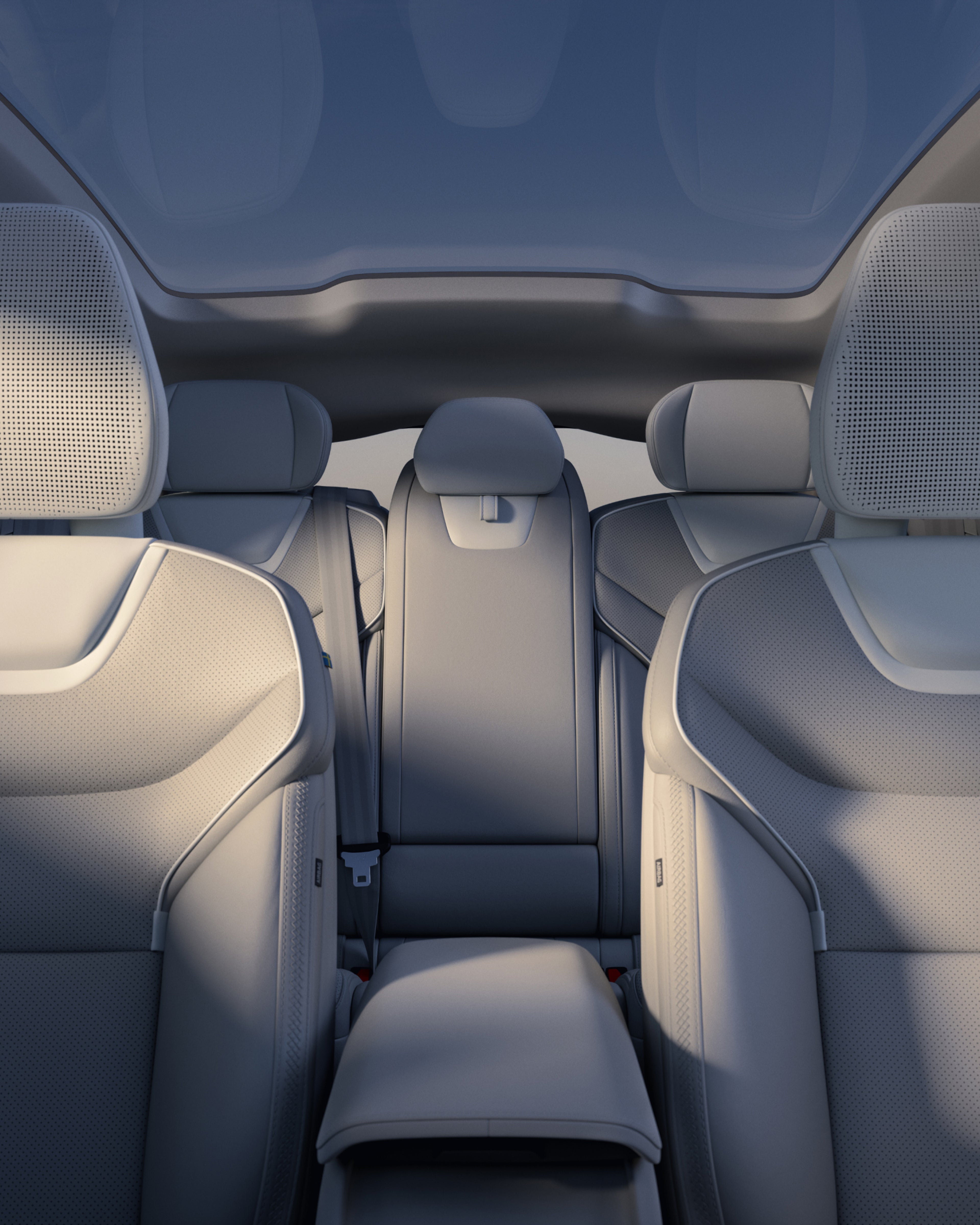 Interiøret i Volvo ES90 med fremhævelse af perforerede forsæder og rigelige bagsæder.