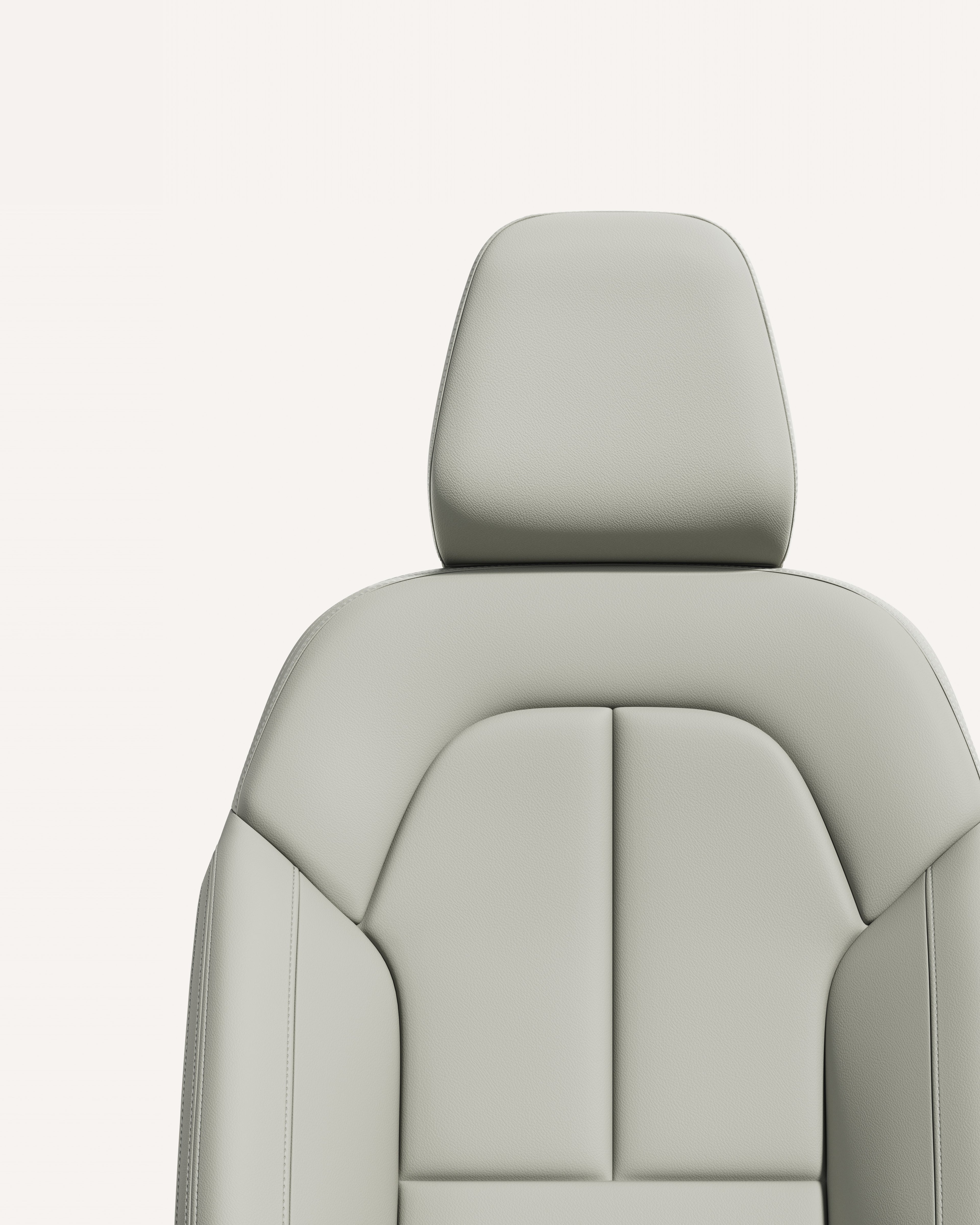 Крупен план на тапацирот на предните седишта во руса боја за Volvo XC40 во бела студиска средина.