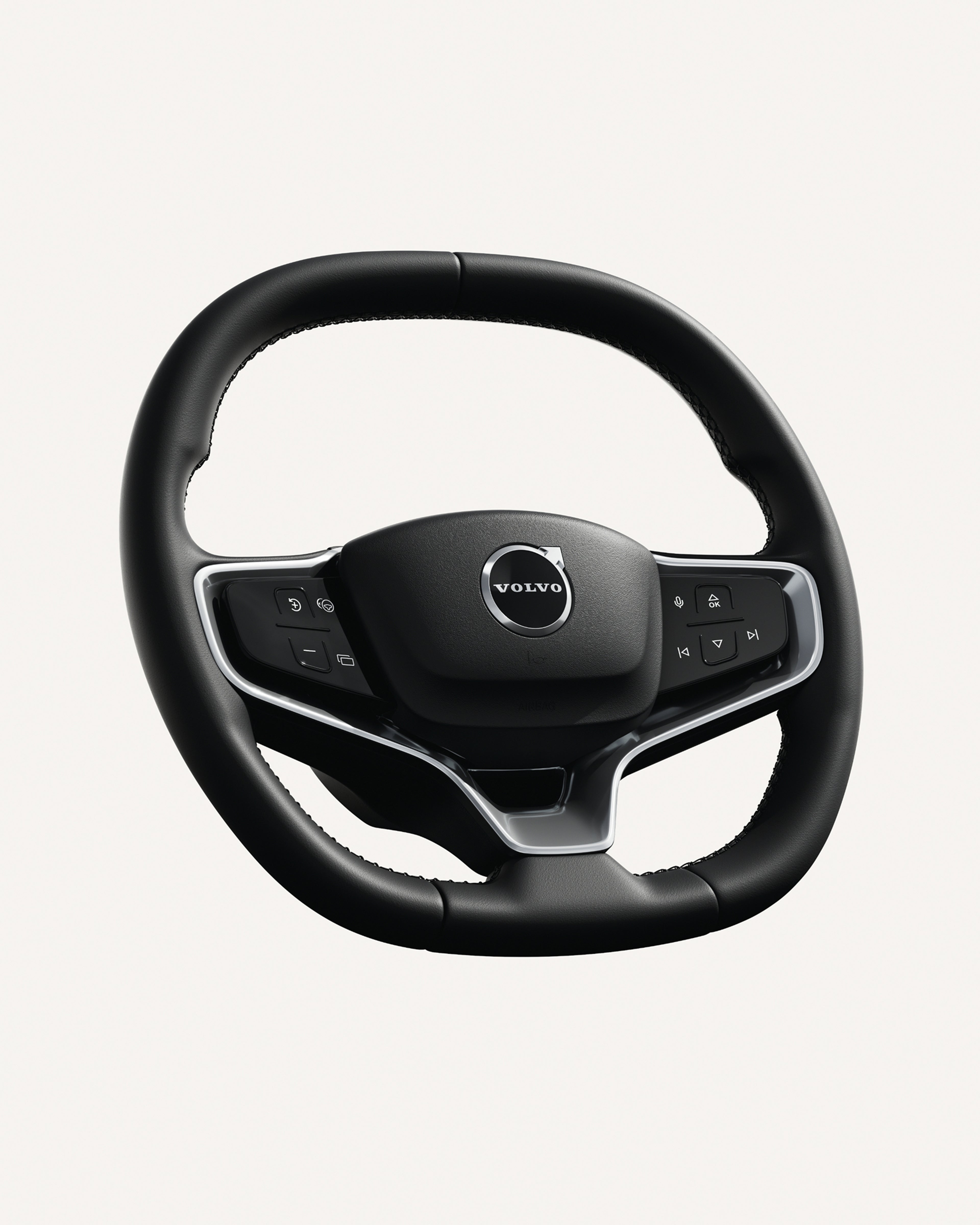 Close-up of the Volvo EX30 steering wheel, featuring integrated controls.