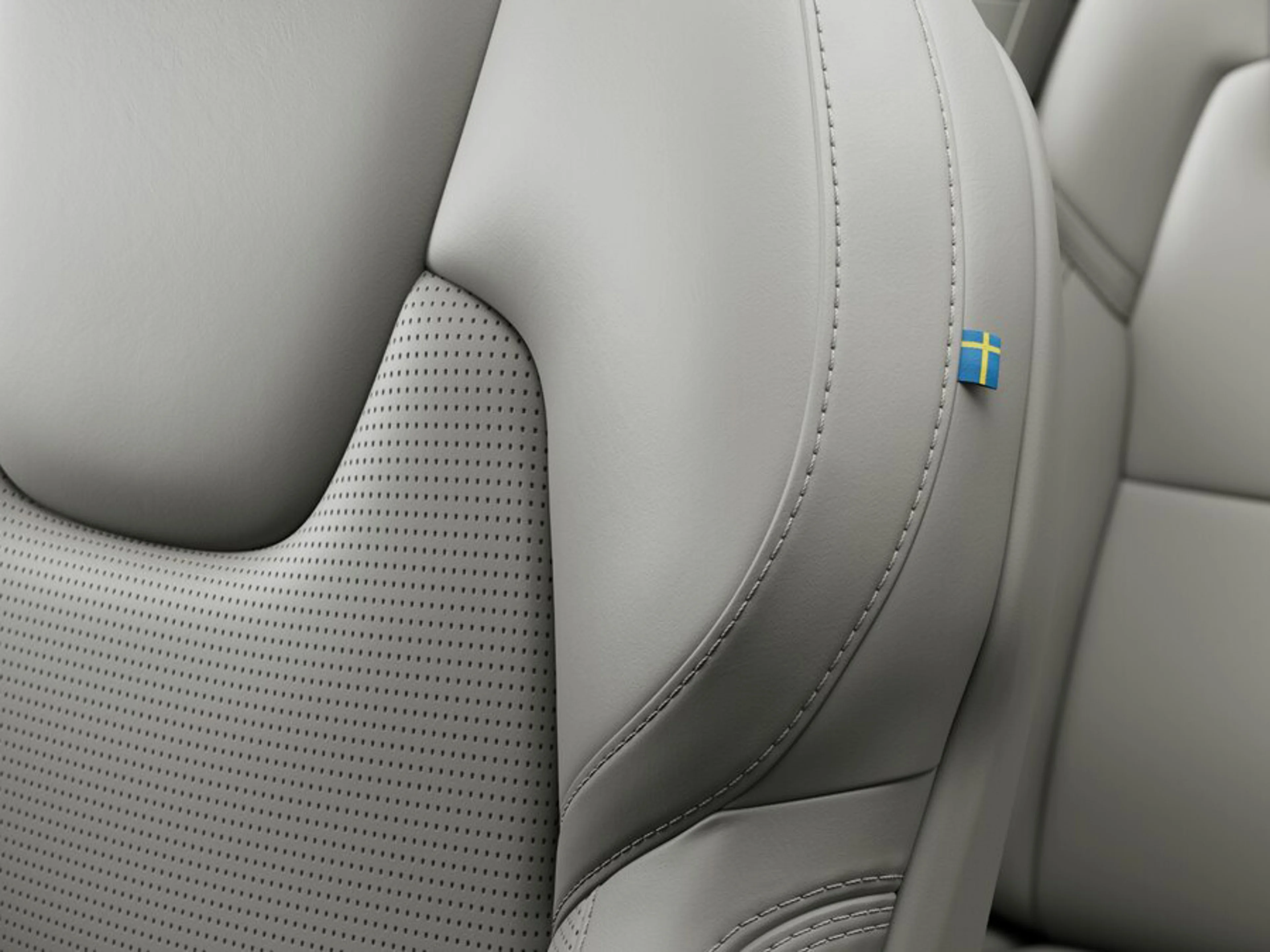 Volvo XC90 雙能電動車量身訂製的無皮革羊毛混紡座椅特寫。