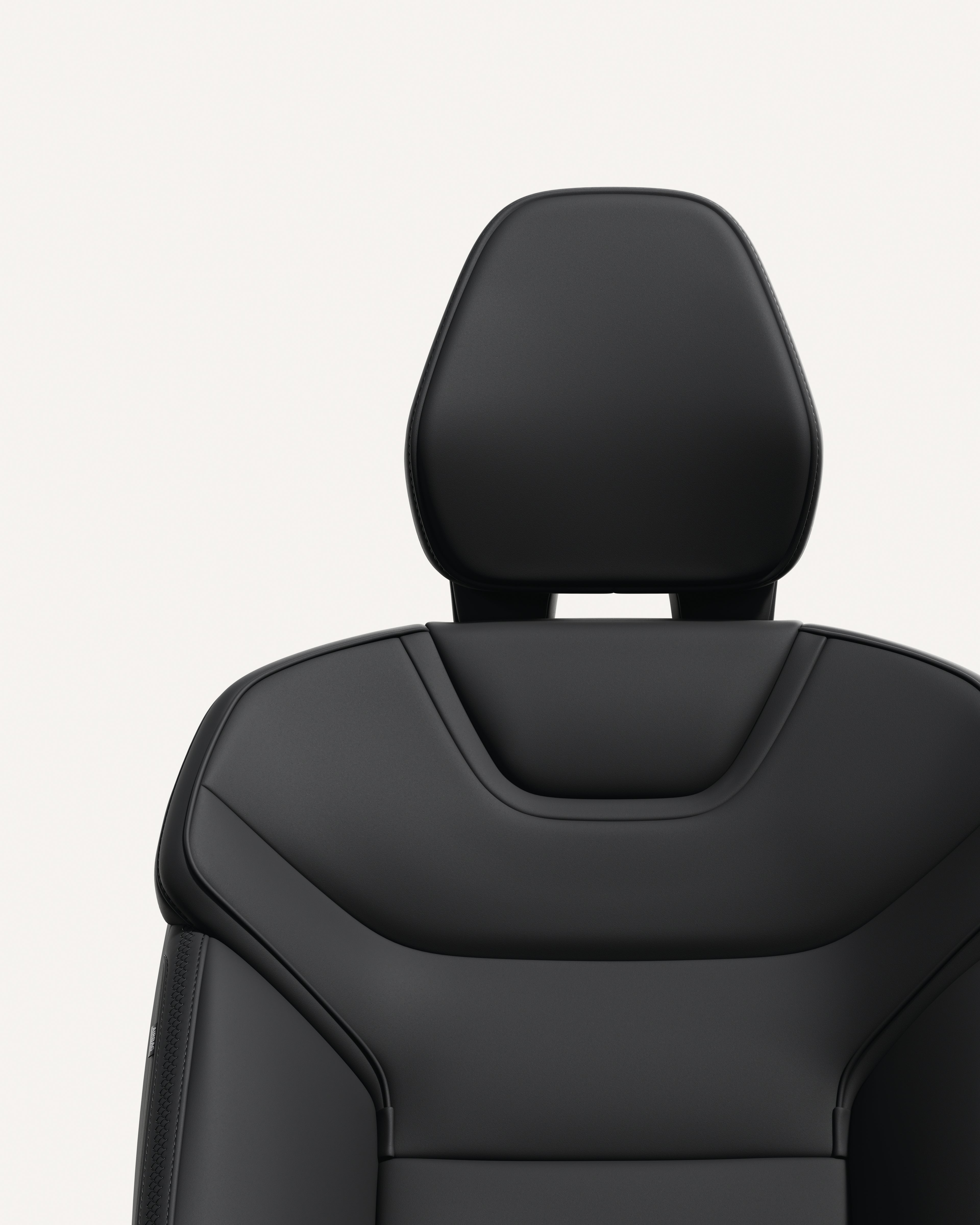 Volvo EX90 seat in material Charcoal with ergonomic design and sleek contours.