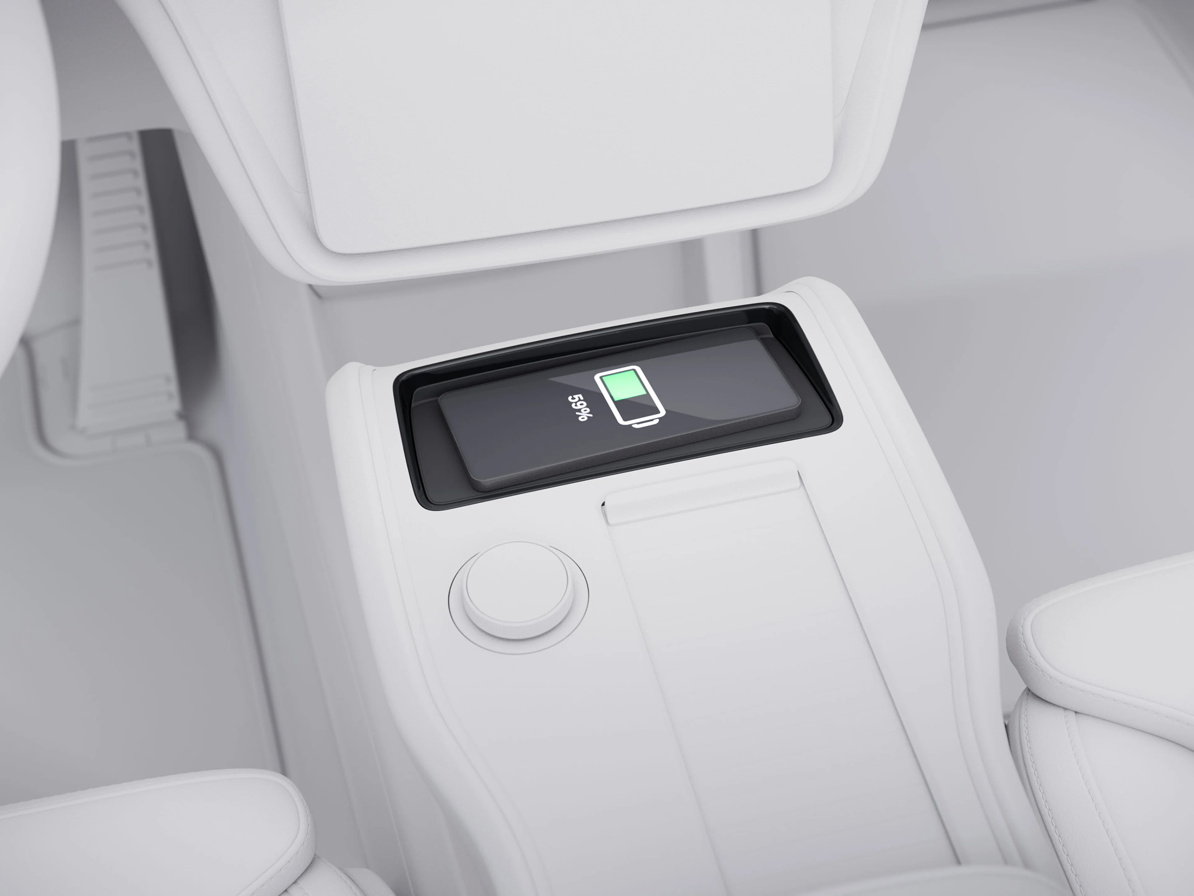Volvo EX90 har en trådlös mobilladdare som är sömlöst integrerad.