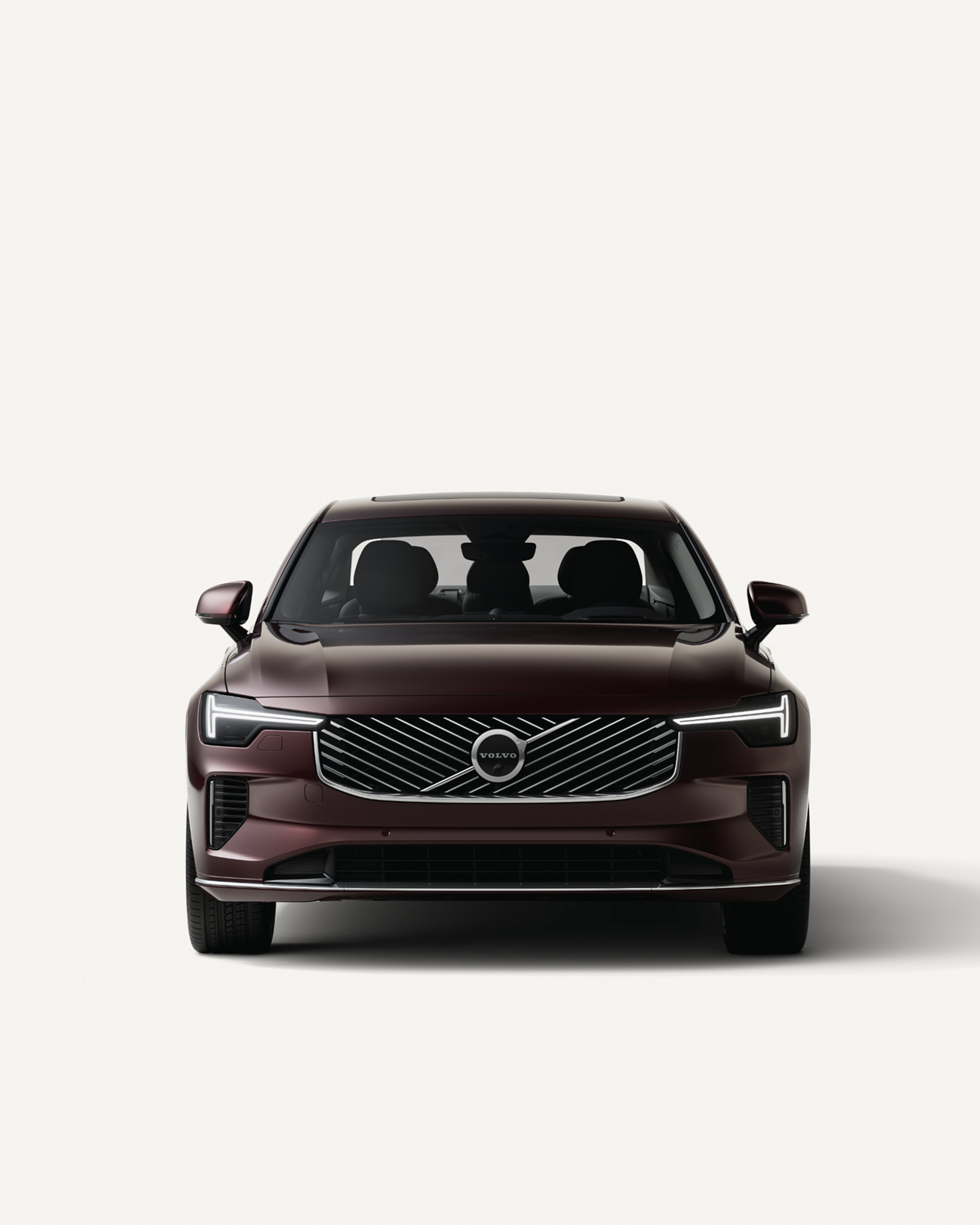 Front view of the Volvo S90 mild hybrid in a white studio environment.