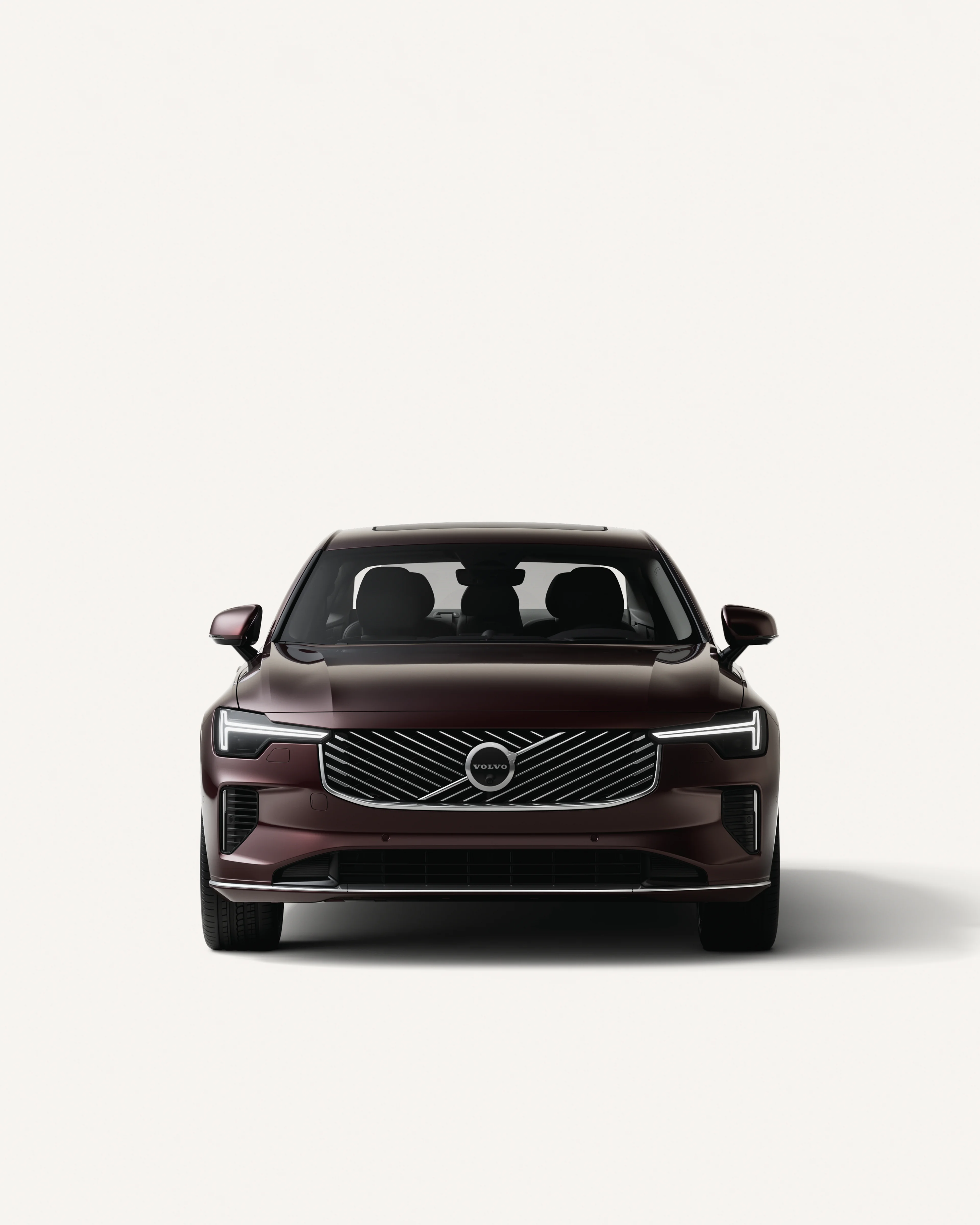 Front view of the Volvo S90 mild hybrid in a white studio environment.