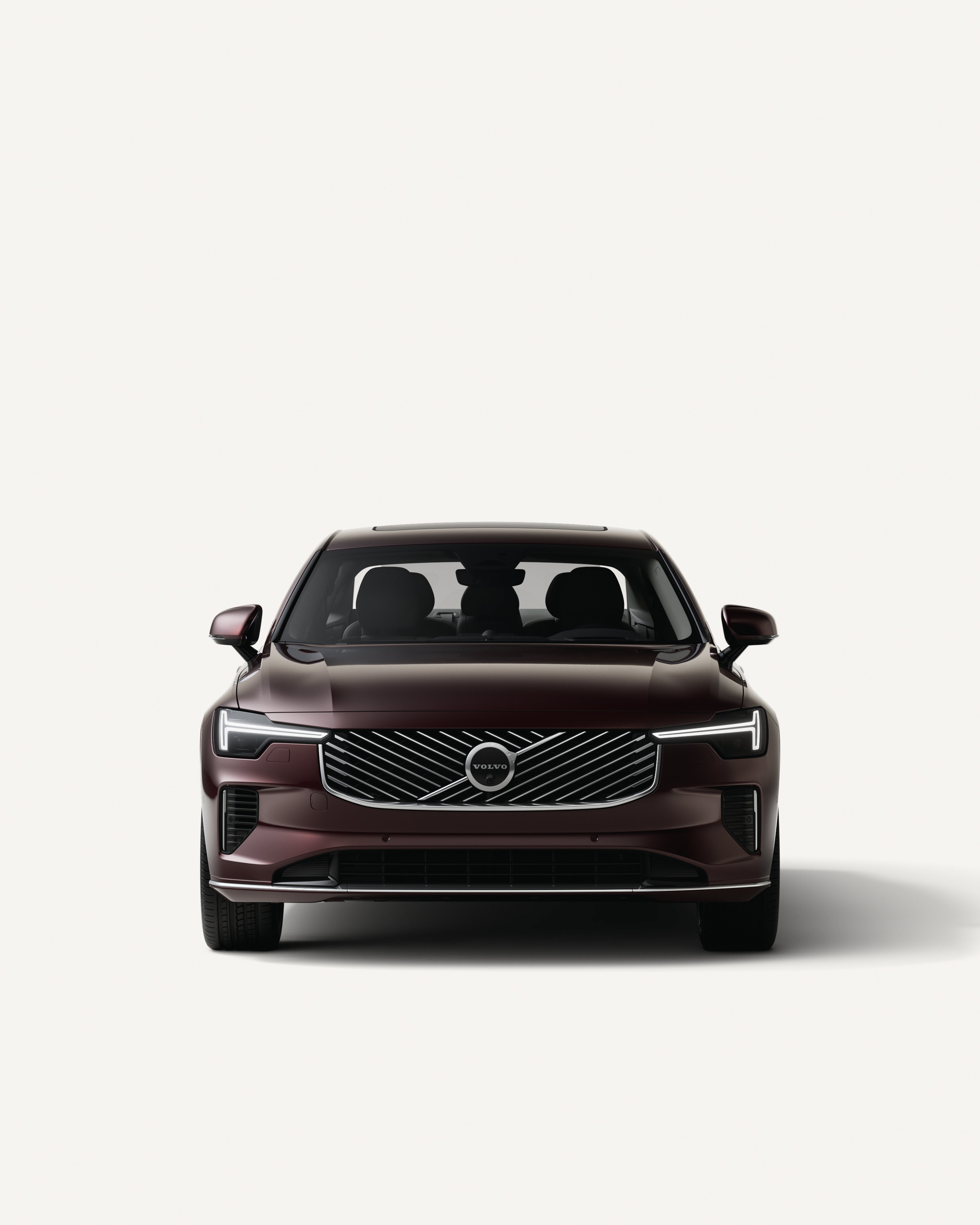 Front view of the Volvo S90 mild hybrid in a white studio environment.
