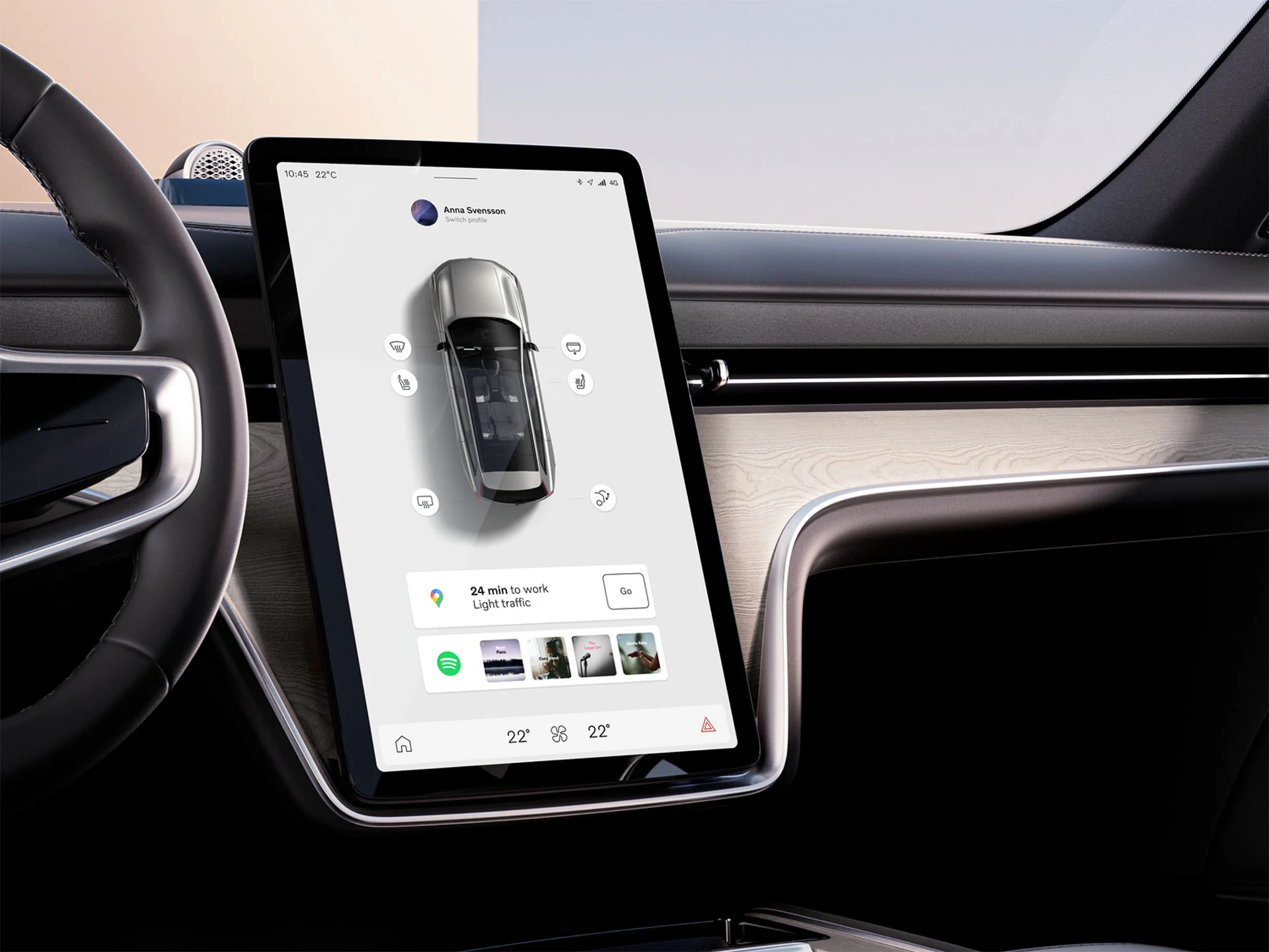 Зображення сенсорного центрального дисплея з місця водія зблизька, на якому показано зображення Volvo EX90 з висоти пташиного польоту в оточенні віджетів.