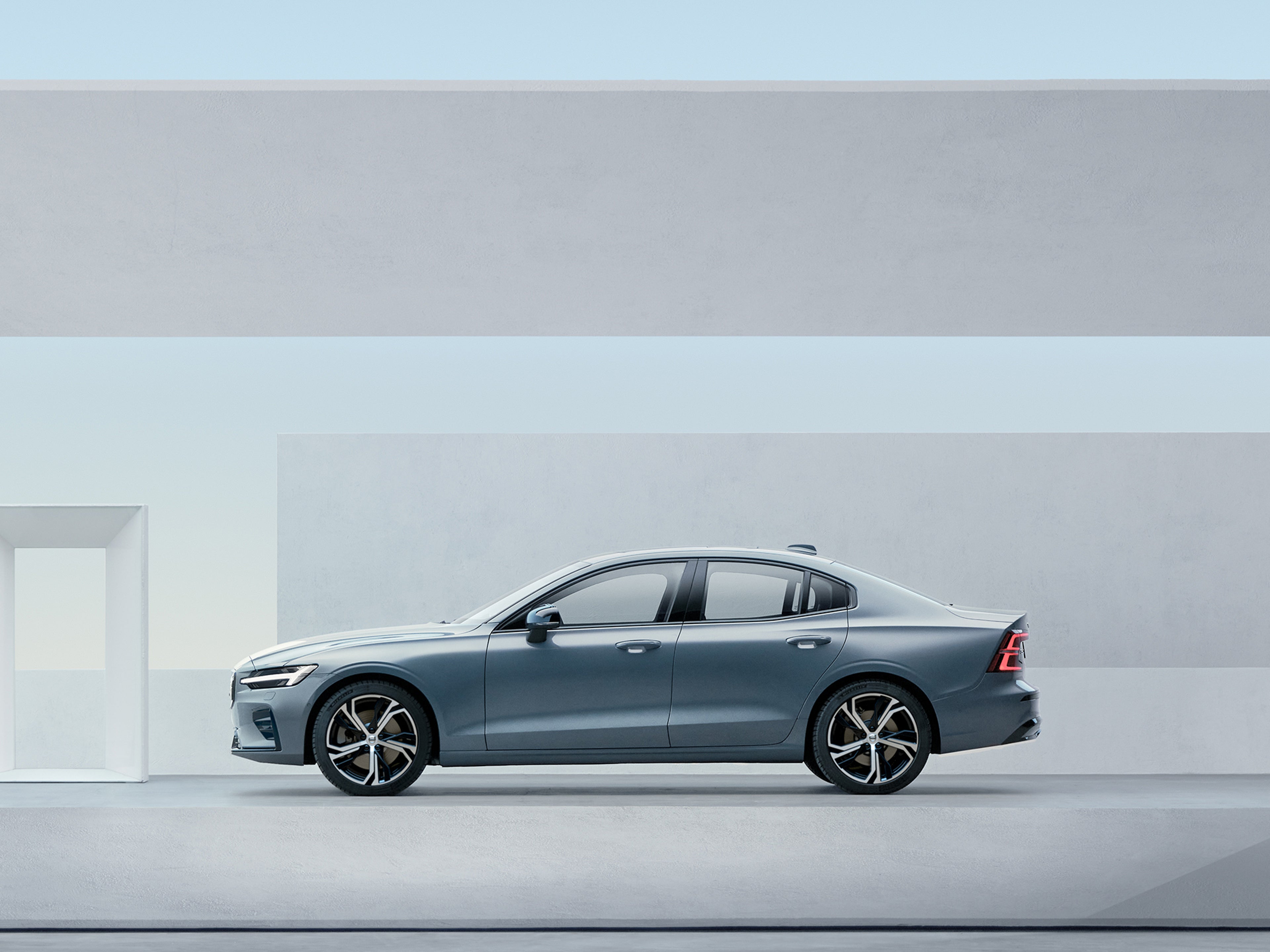 The side profile of a Volvo S60 sedan.