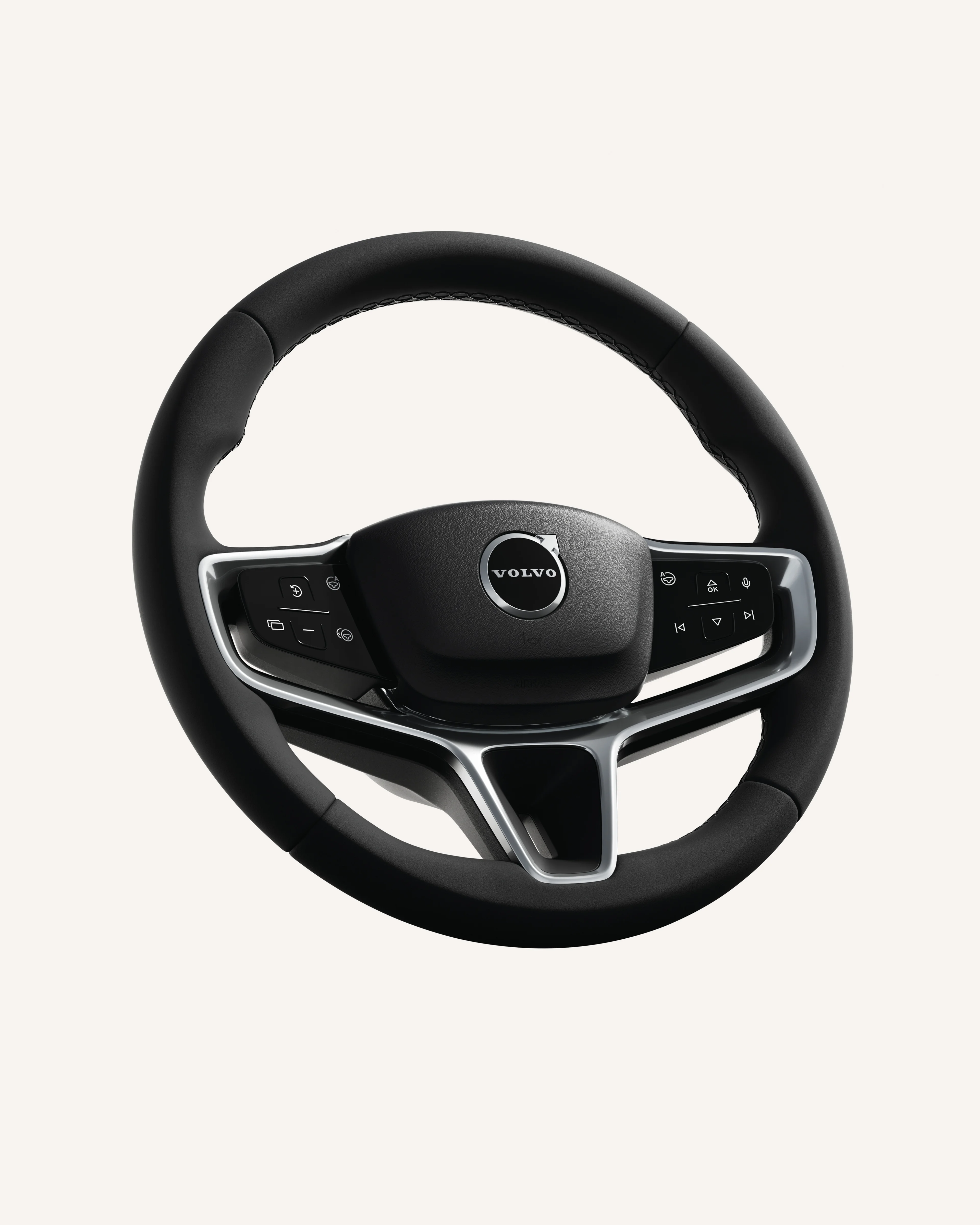 Närbild av ratten i Volvo EX90 med integrerade reglage.