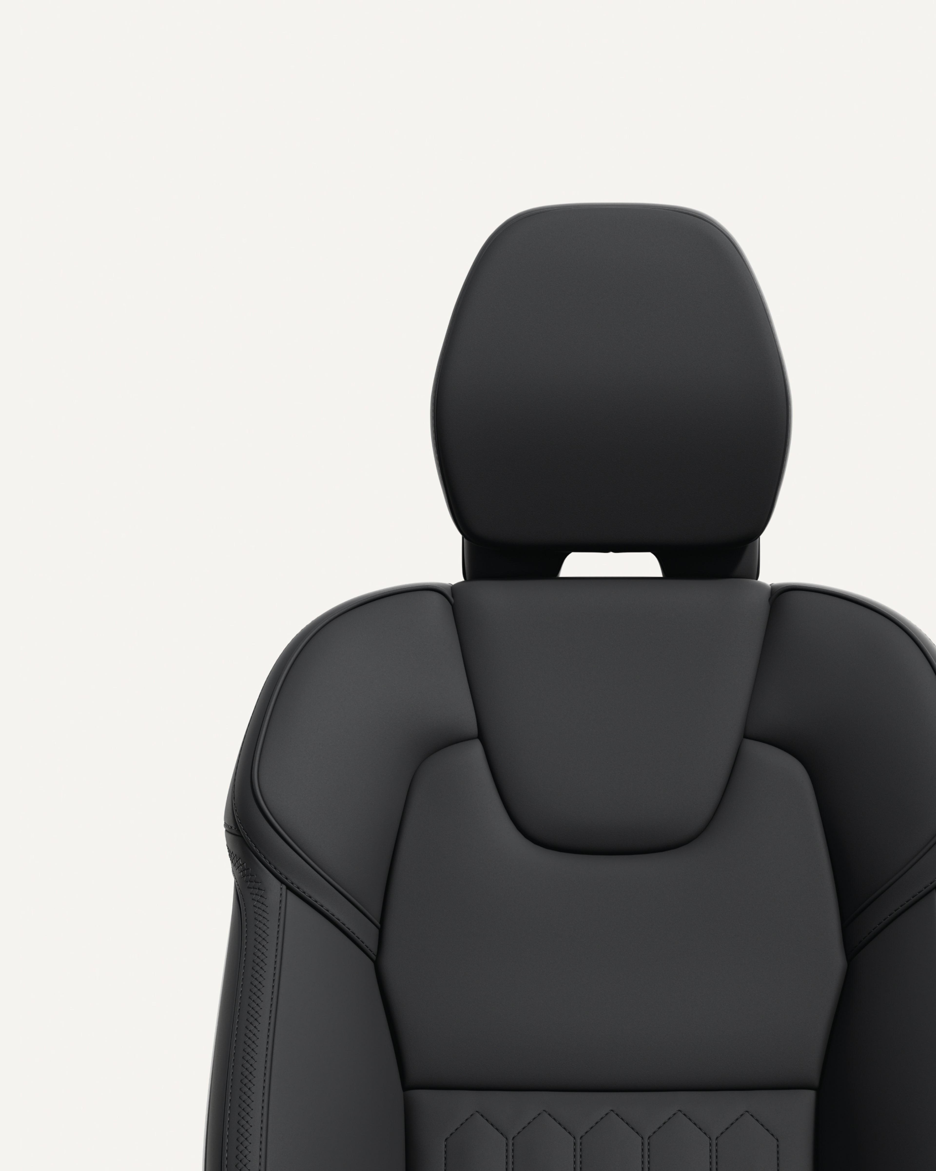 Close-up of the front seat charcoal upholstery in the Volvo XC60 midsize mild hybrid SUV.