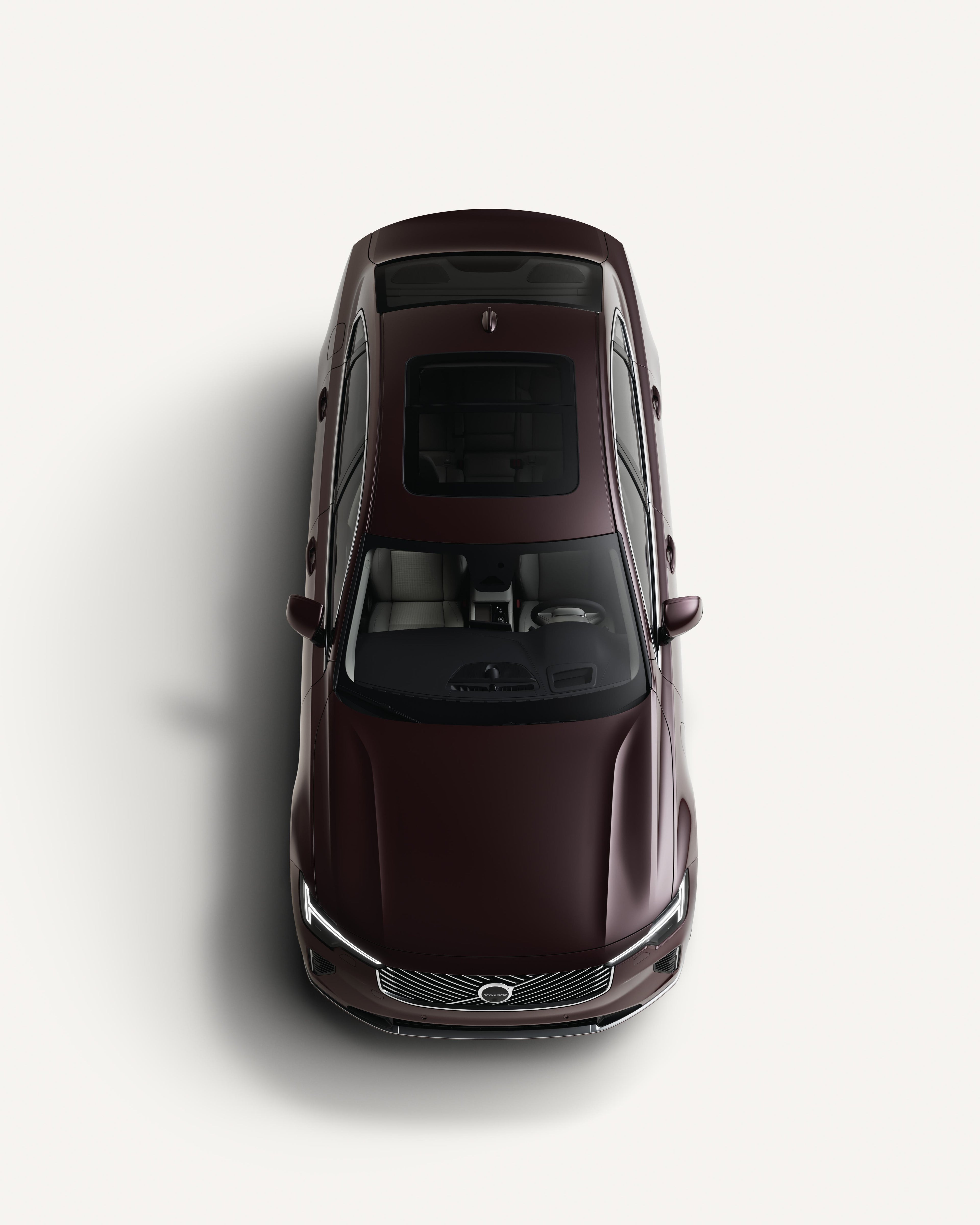 Top-down view of the Volvo S90 showcasing its roof in a white studio environment.