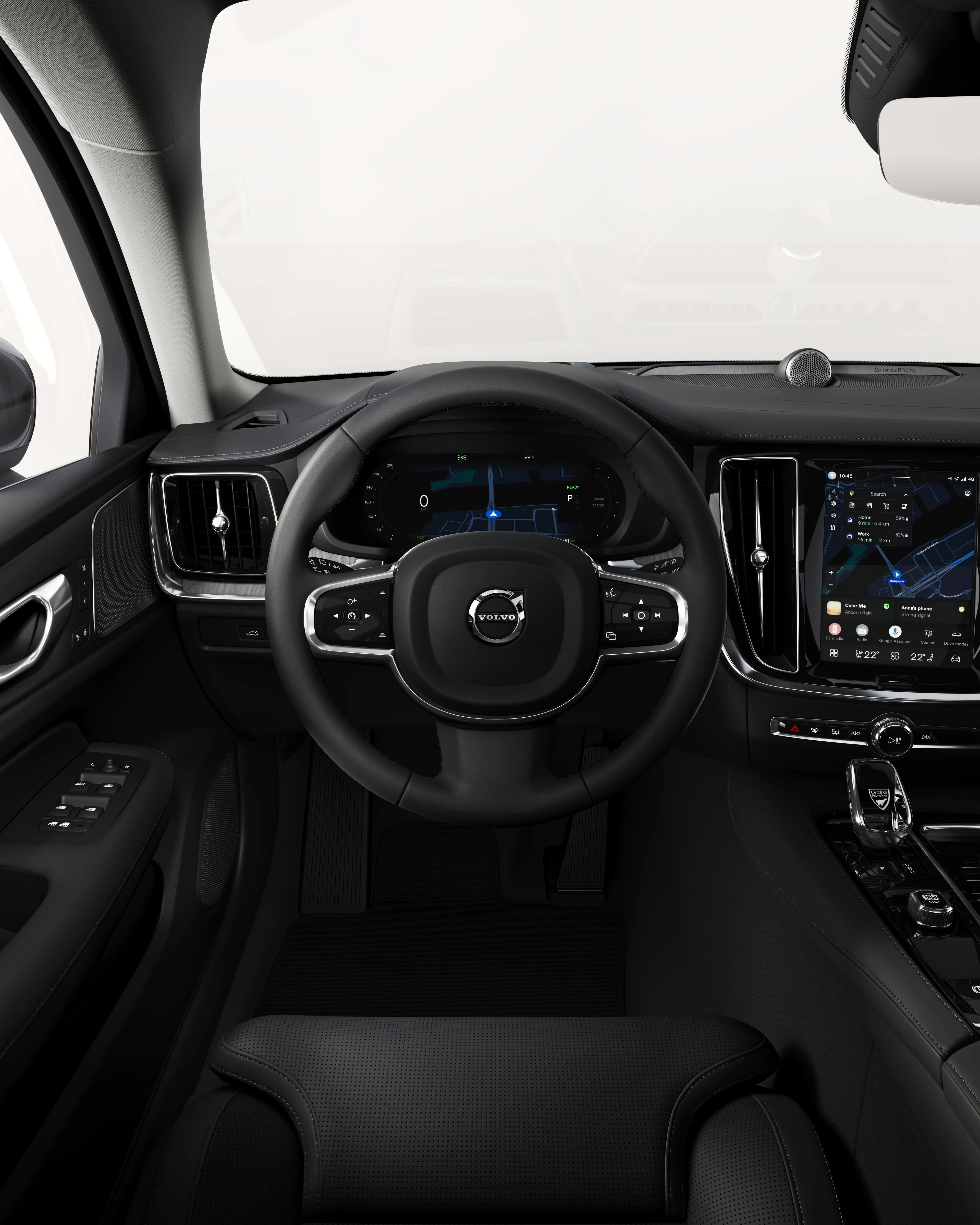 Back seat view of the Volvo V60 dashboard, including steering wheel and touchscreen.