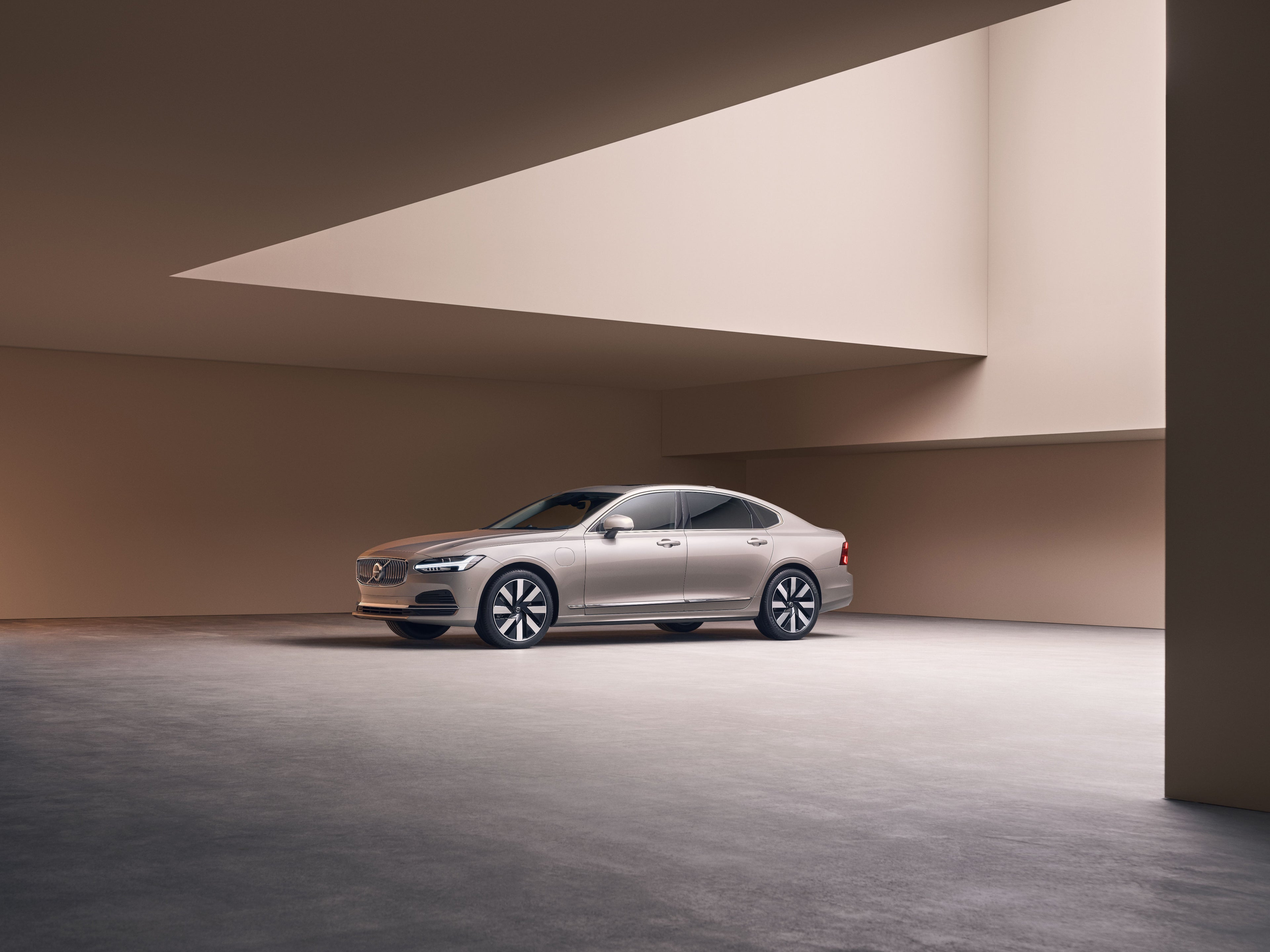 Picture showing the exterior of a Volvo S90 from a distance.