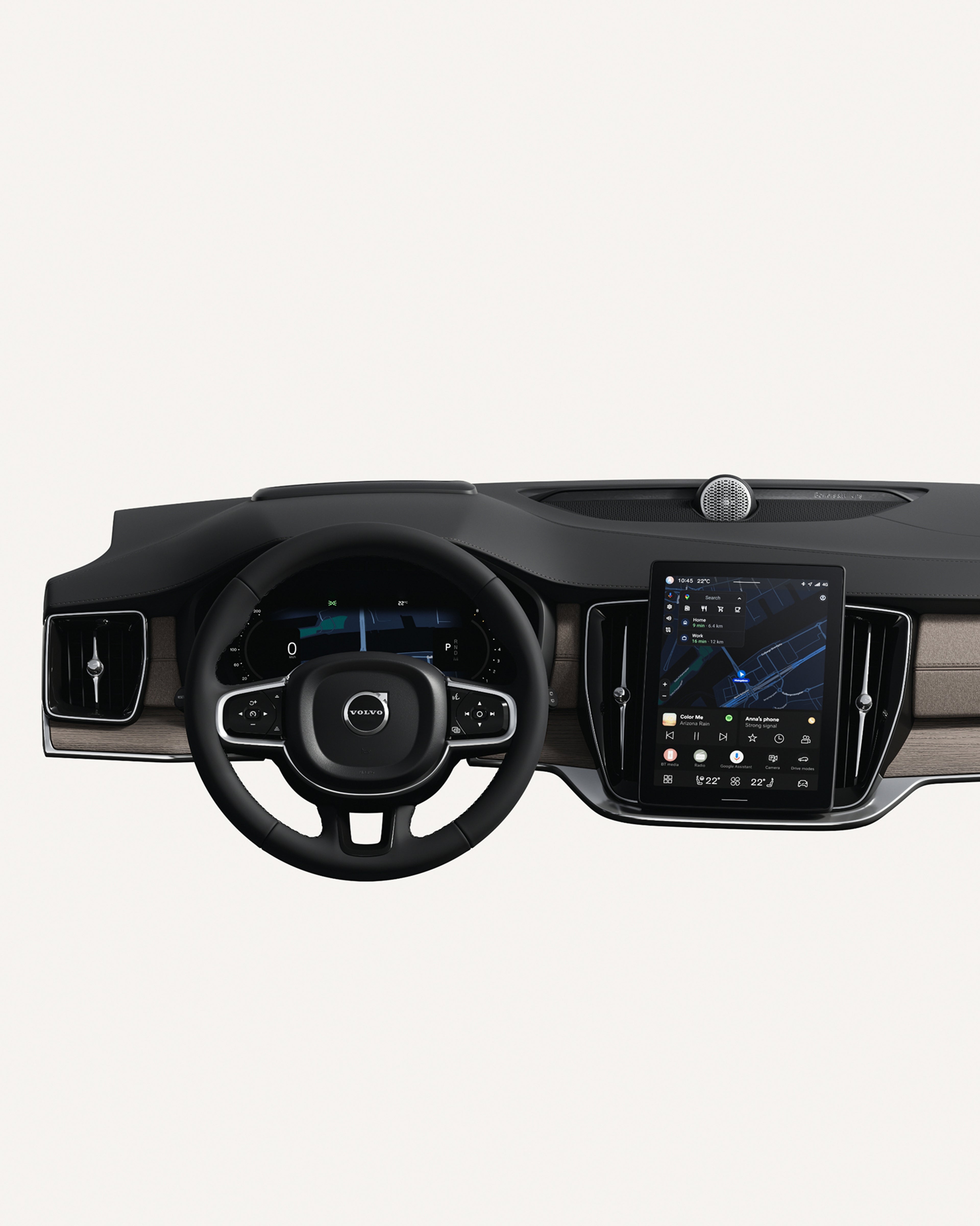Vue intérieure du tableau de bord de la Volvo XC90, mettant en évidence le volant et l’écran tactile.