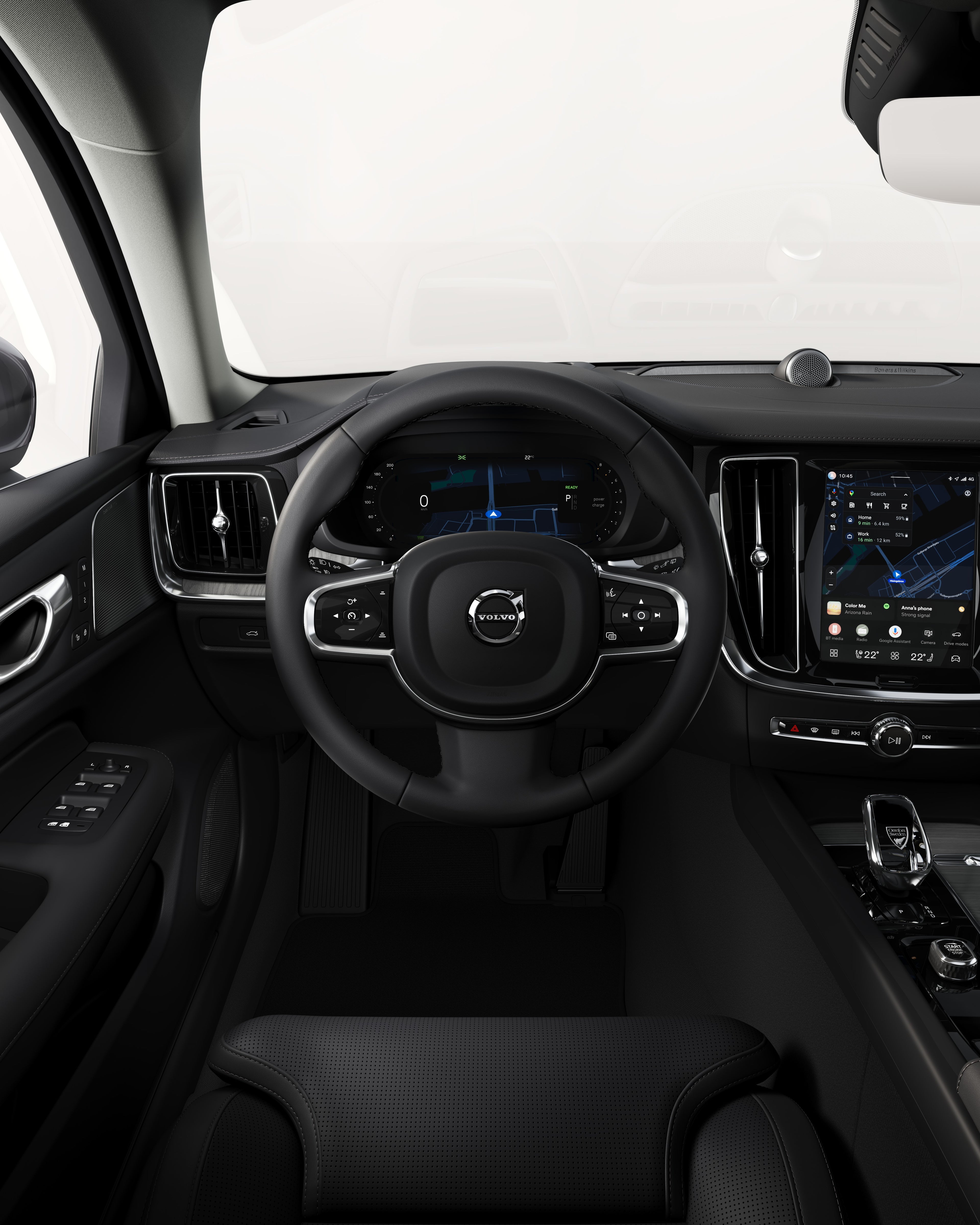 Blick vom Rücksitz auf das Armaturenbrett des Volvo V60 mit Lenkrad und Touchscreen.
