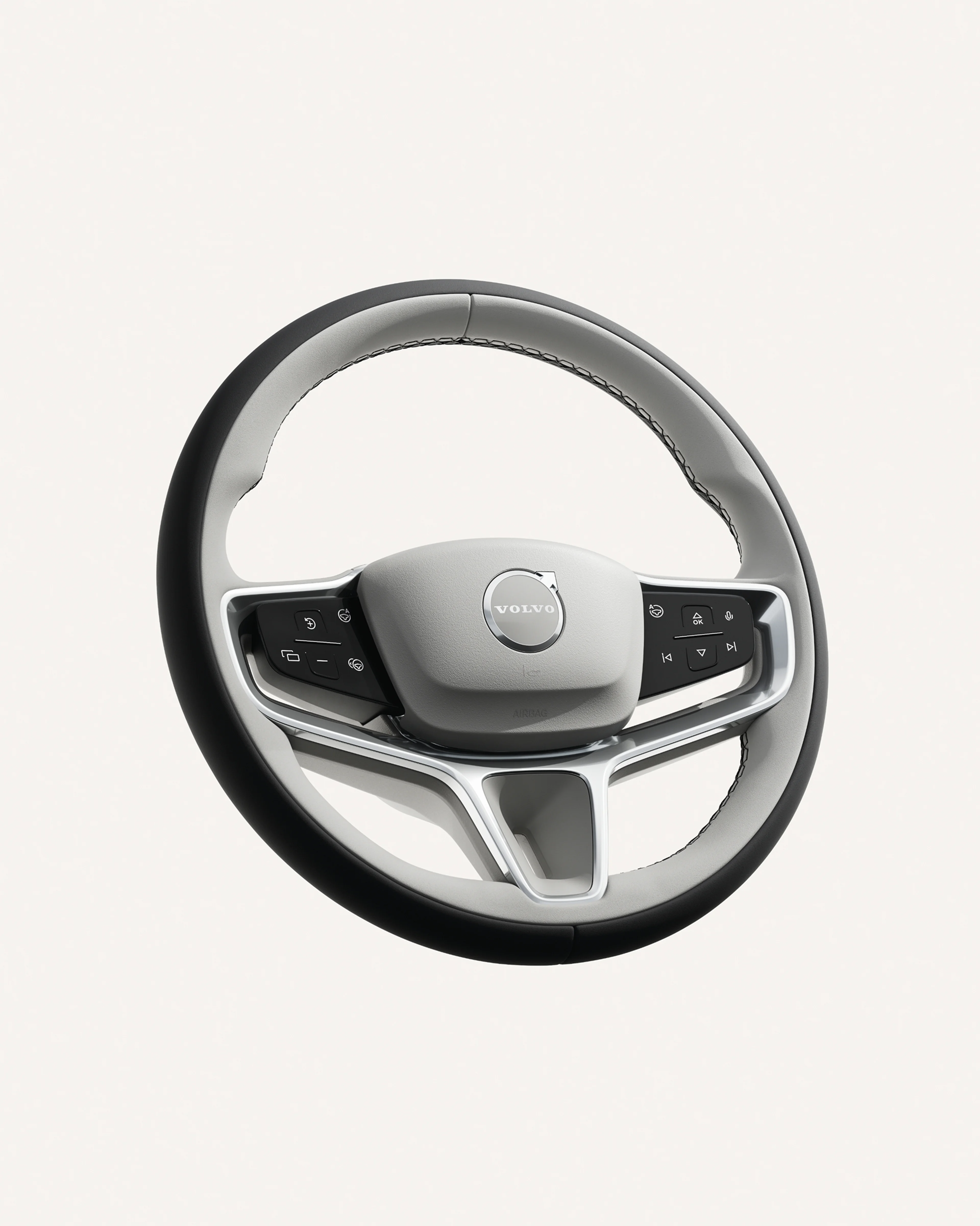 Nahaufnahme des Lenkrads des Volvo ES90 mit integrierten Bedienelementen.