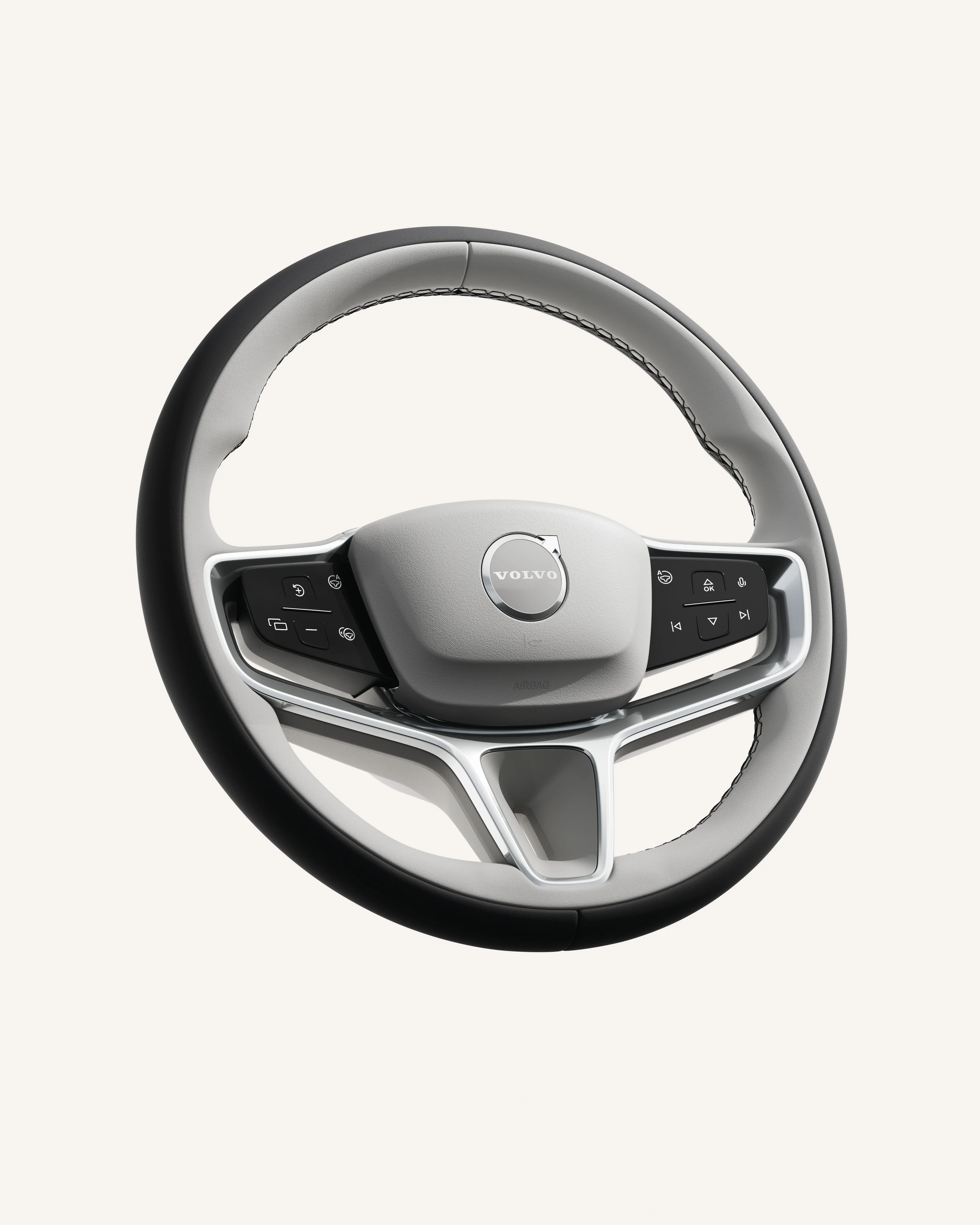 A Volvo ES90 kormánykereke és az azon elhelyezett kezelőszervek, közeli képen.