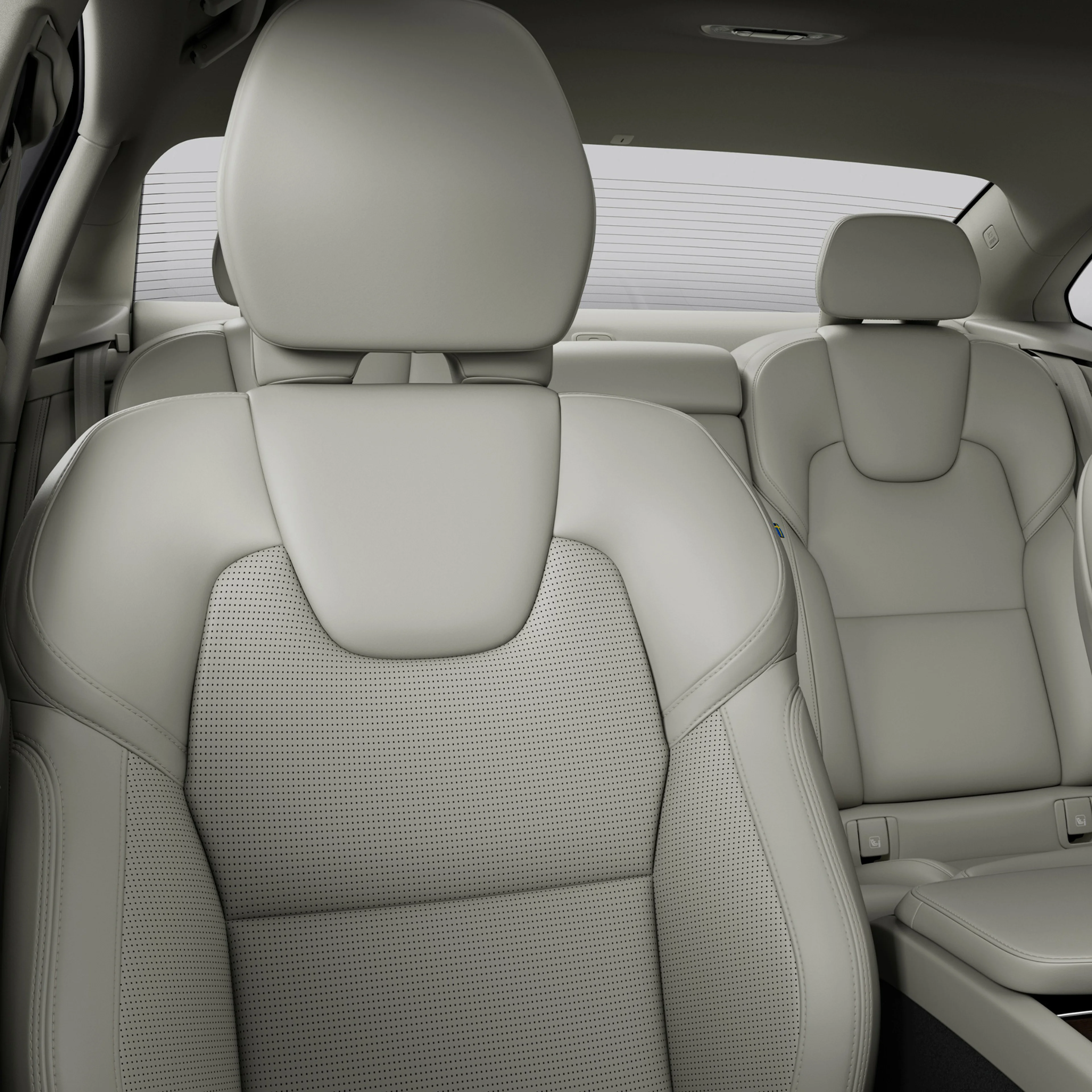 Cabin interior of Volvo S90 sedan.