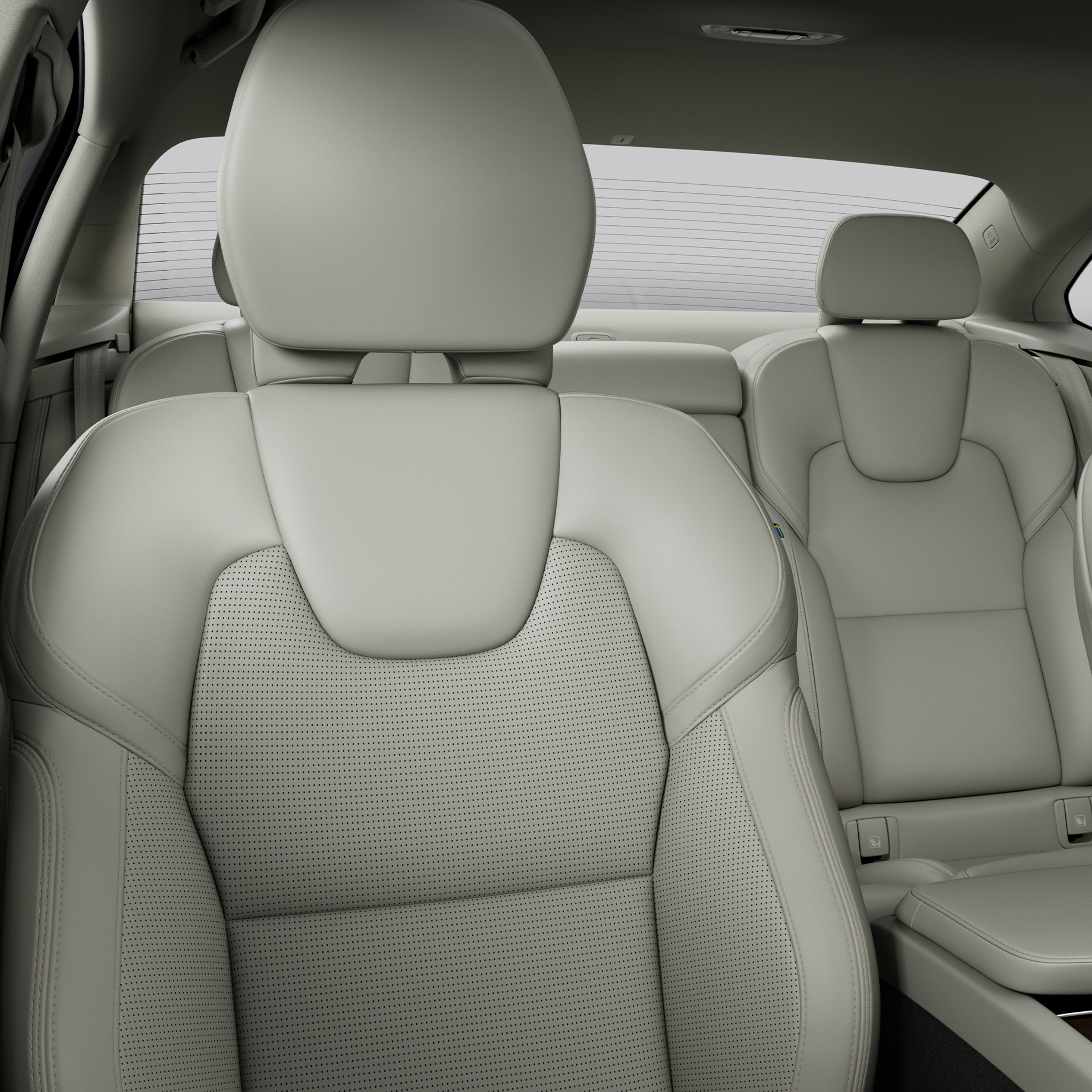 Cabin interior of Volvo S90 sedan.