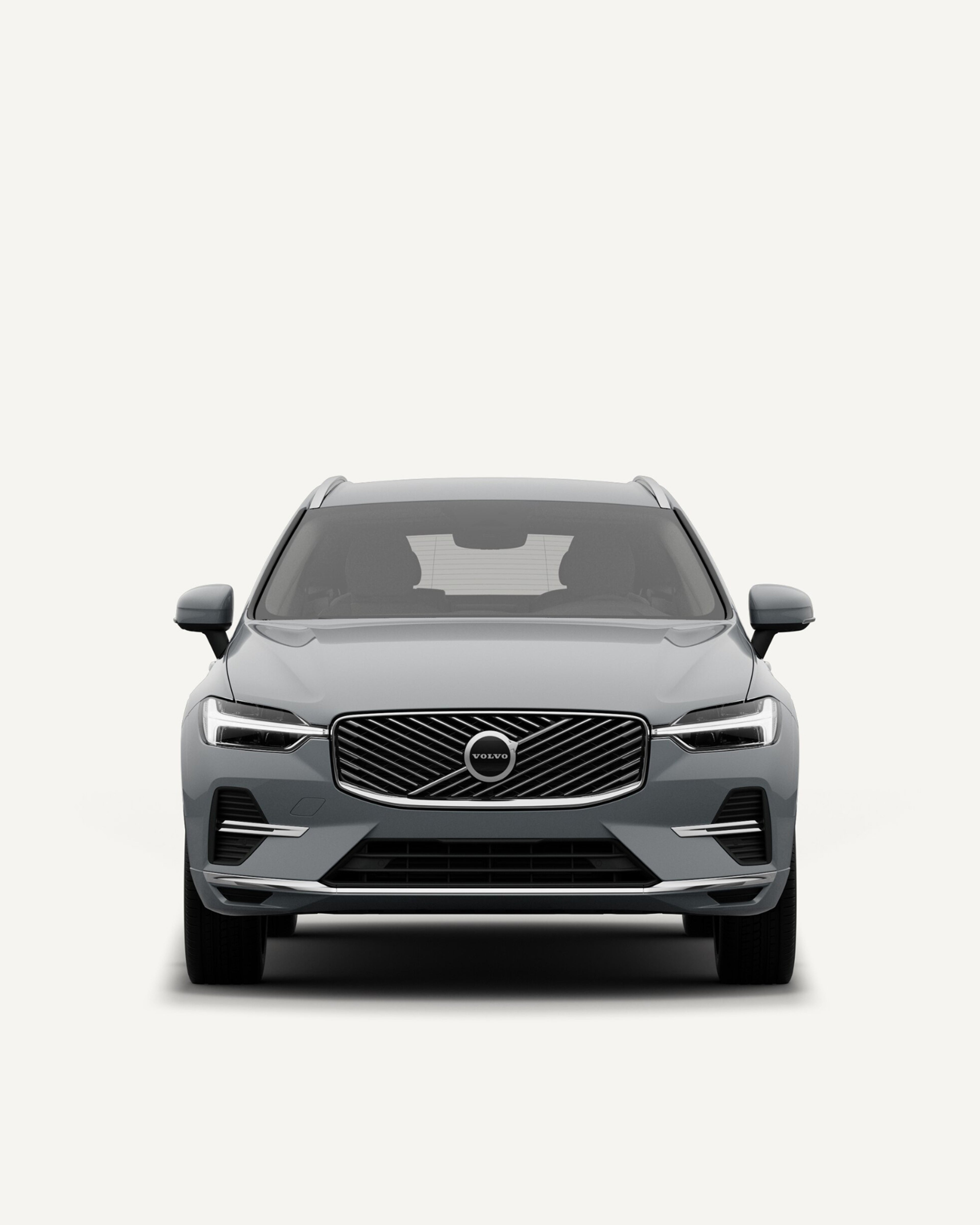 Front view of the Volvo XC60 midsize mild-hybrid SUV in a white studio environment.