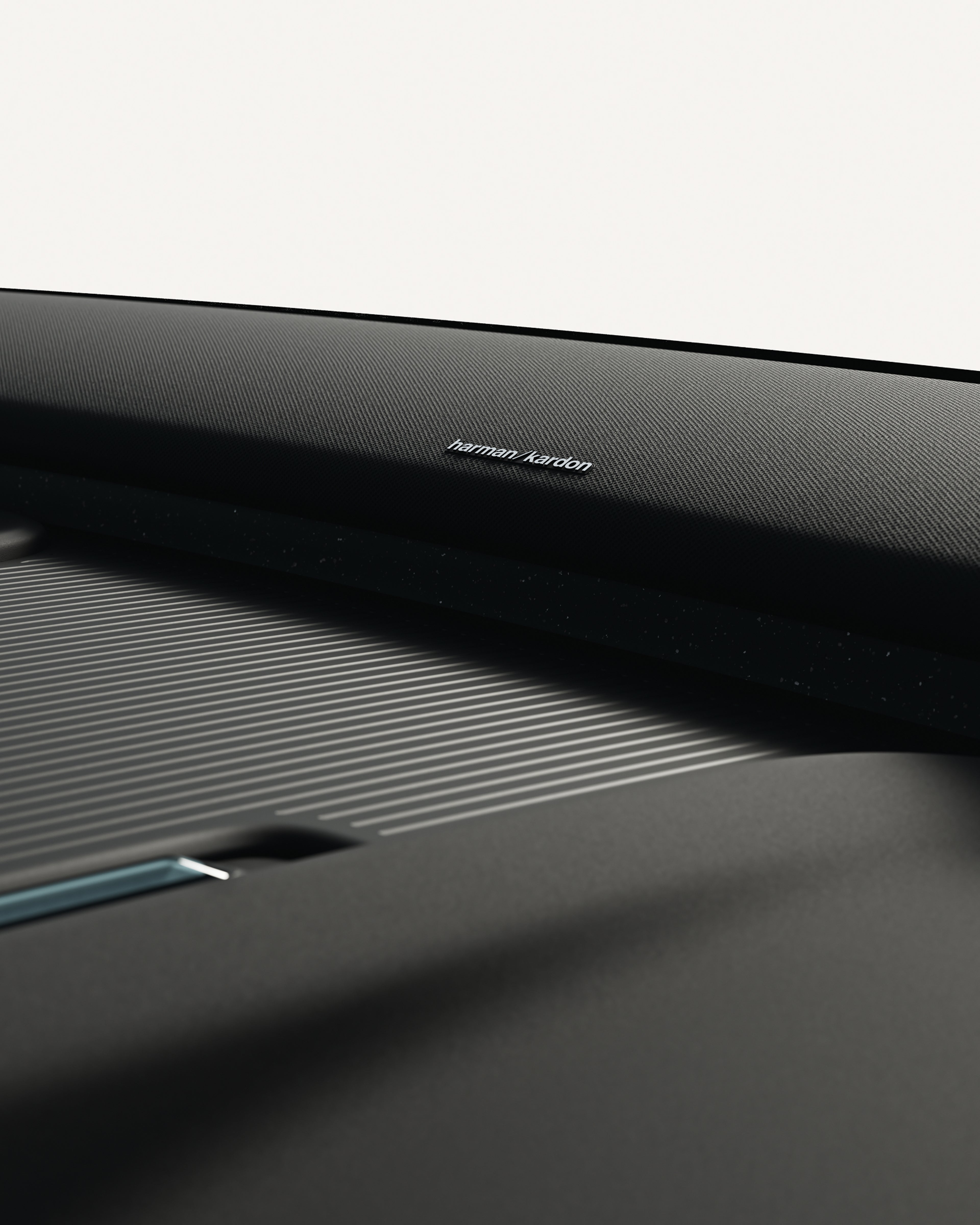 Primo piano della soundbar Harman Kardon montata sul cruscotto di Volvo EX30.