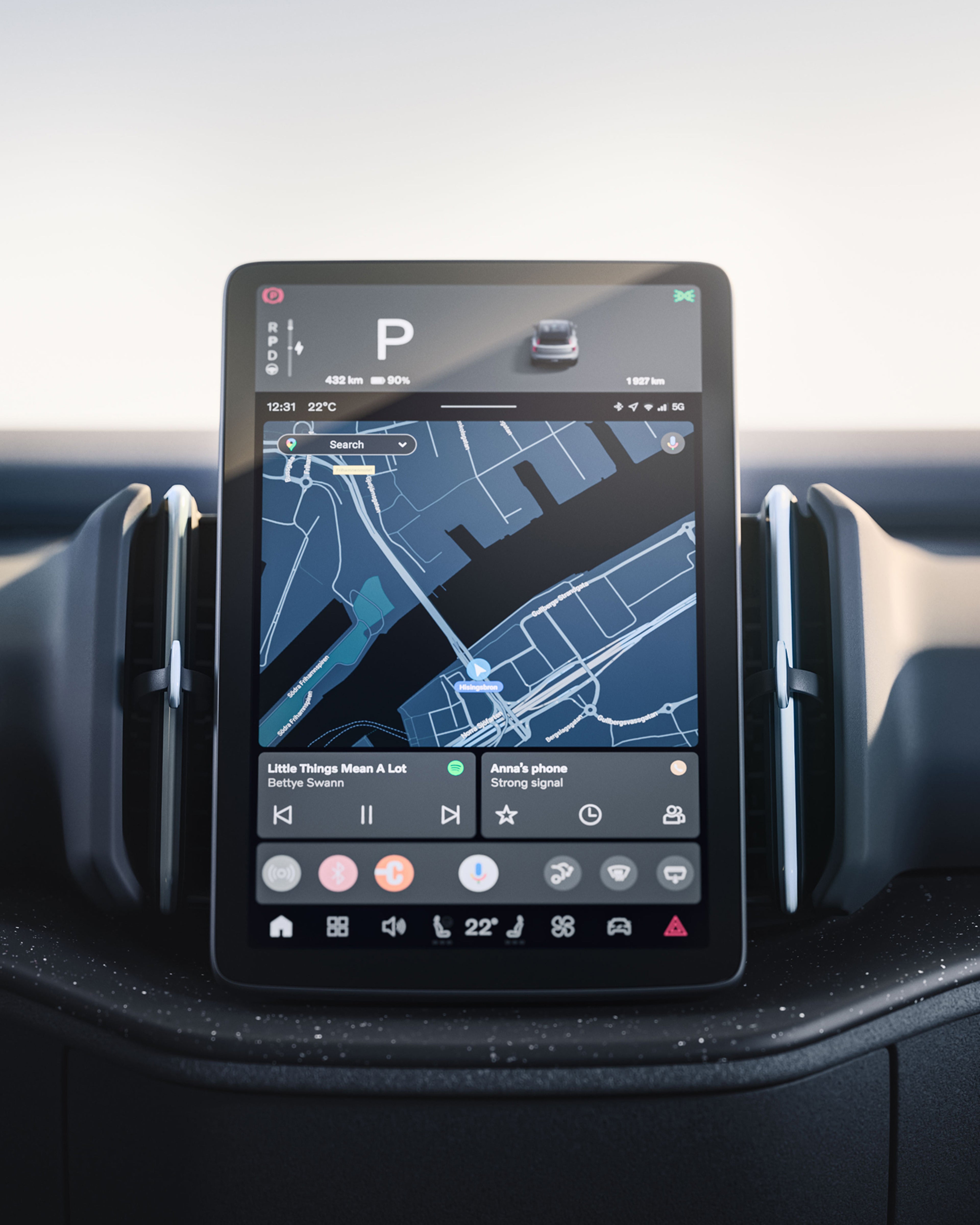 Volvo EX30 centrinis jutiklinis ekranas, kuriame rodomi navigacijos ir medijos valdikliai.