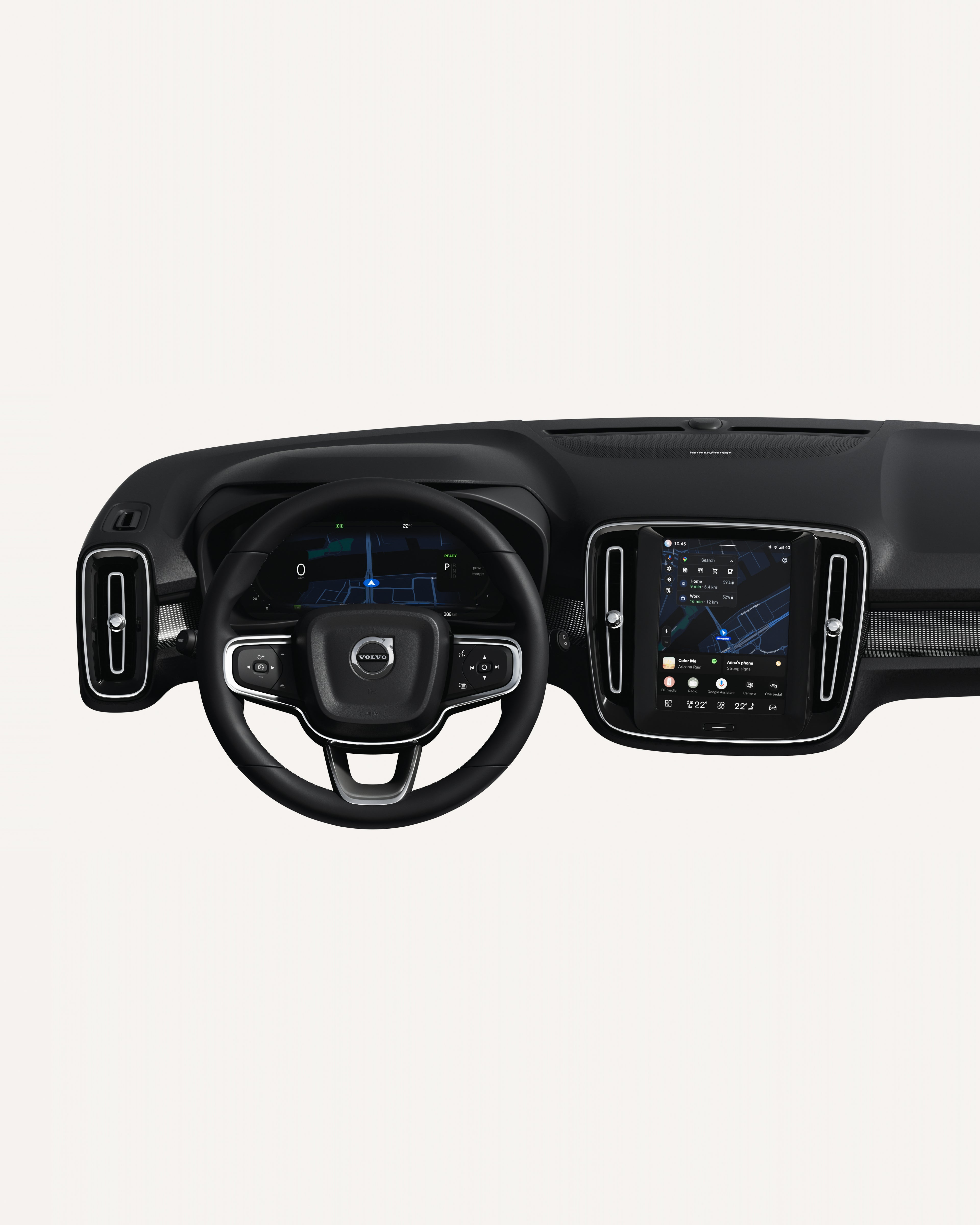 Interior view of the Volvo EX40 dashboard, including steering wheel and touchscreen.