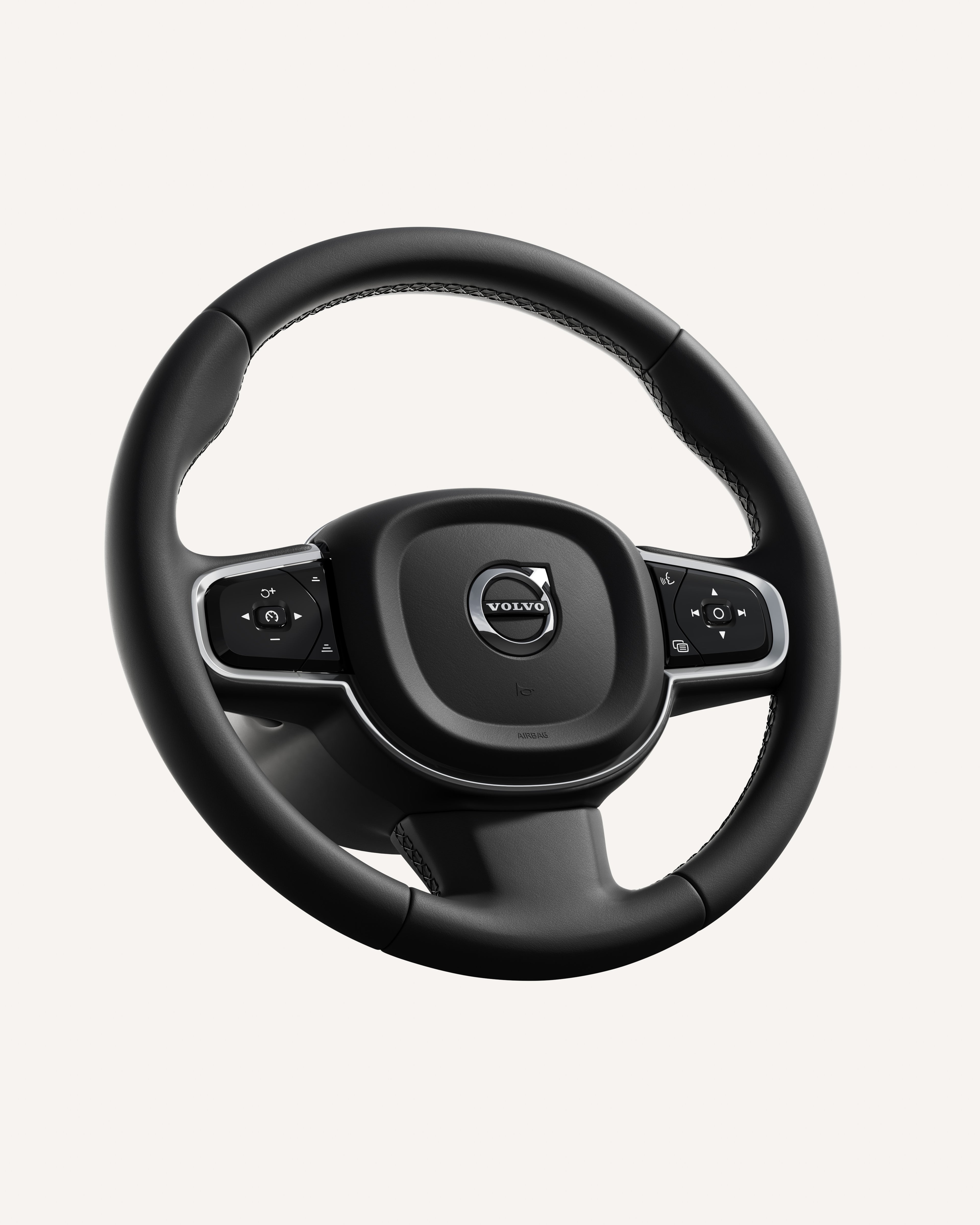Close-up van het Volvo V60 stuurwiel met geïntegreerde bedieningselementen.