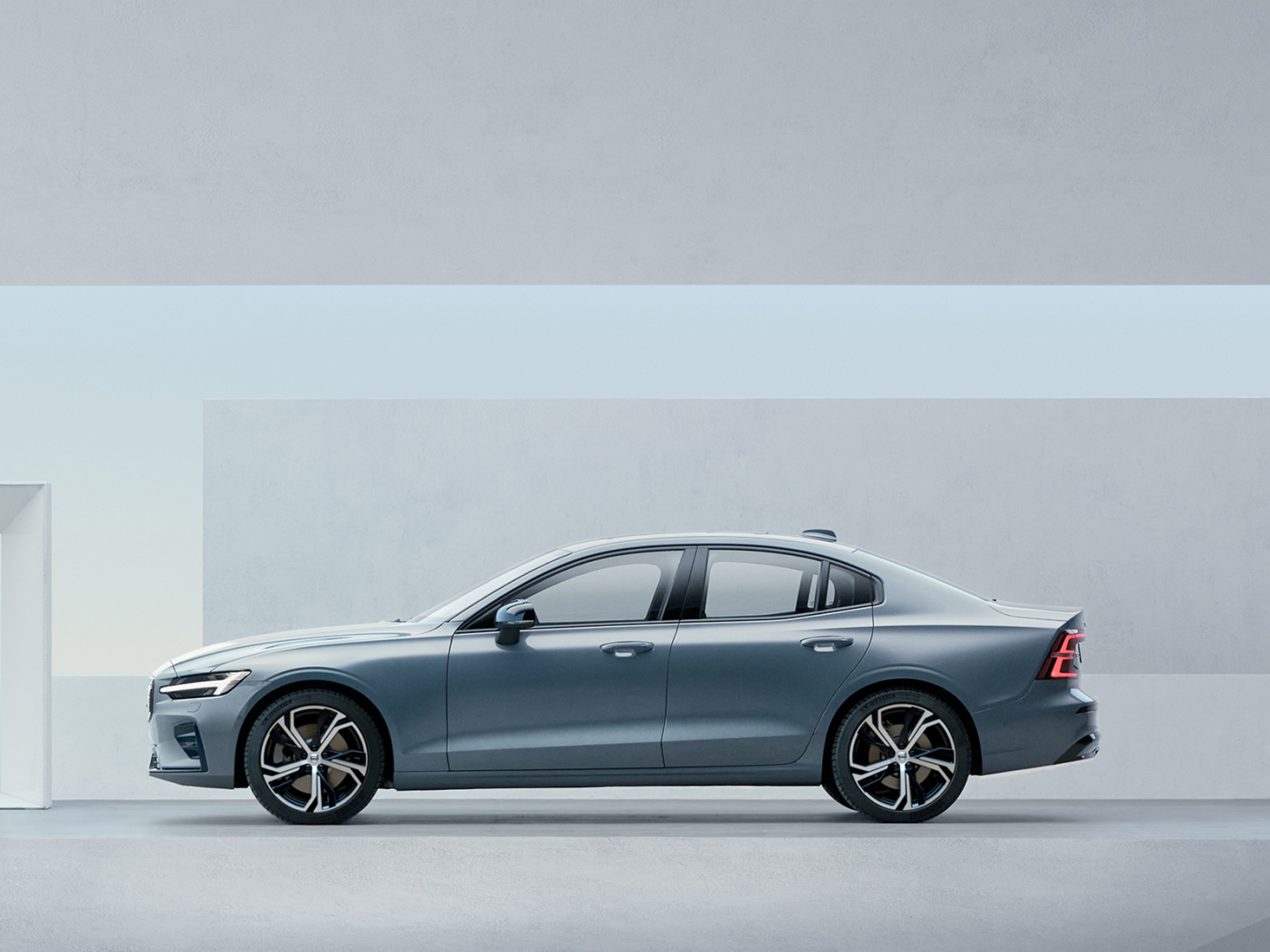 The side profile of a Volvo S60 sedan.