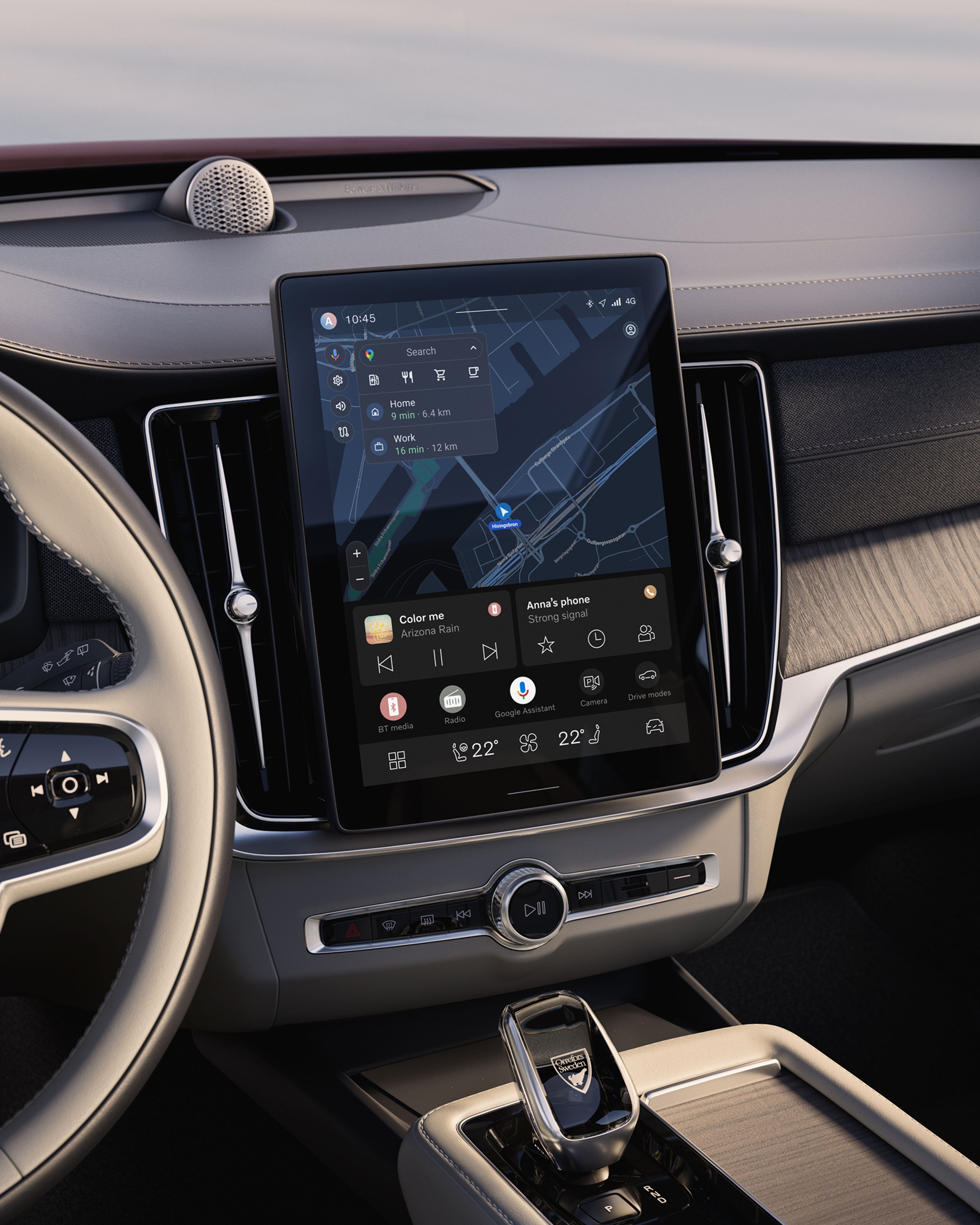 Central touchscreen displaying navigation and media controls in the Volvo S90 mind hybrid.