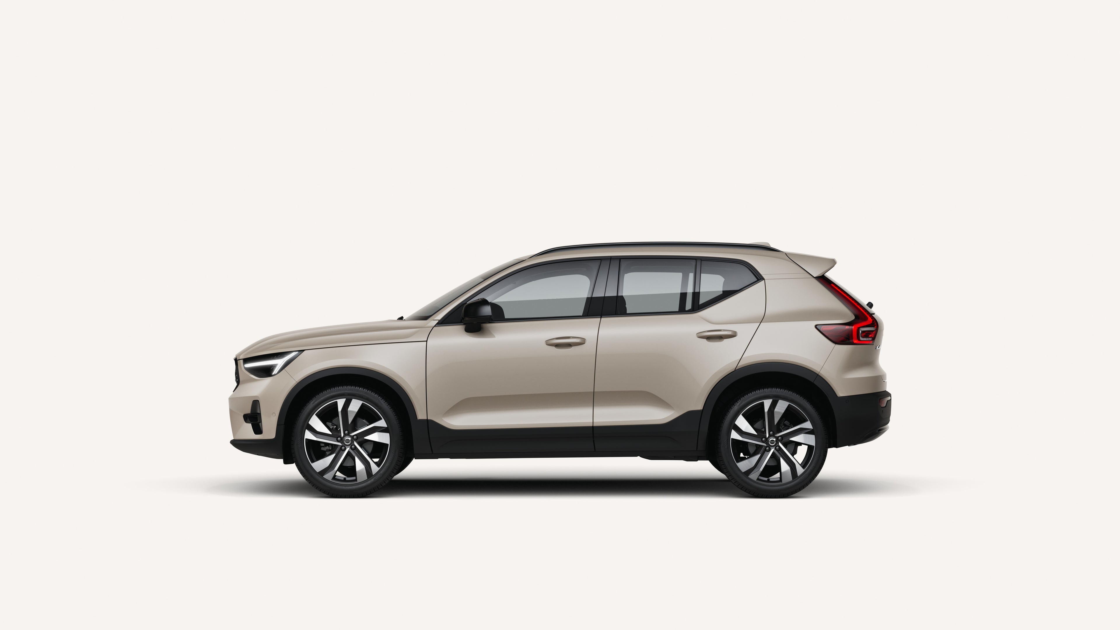 Side view of the Volvo XC40 in a white studio environment.