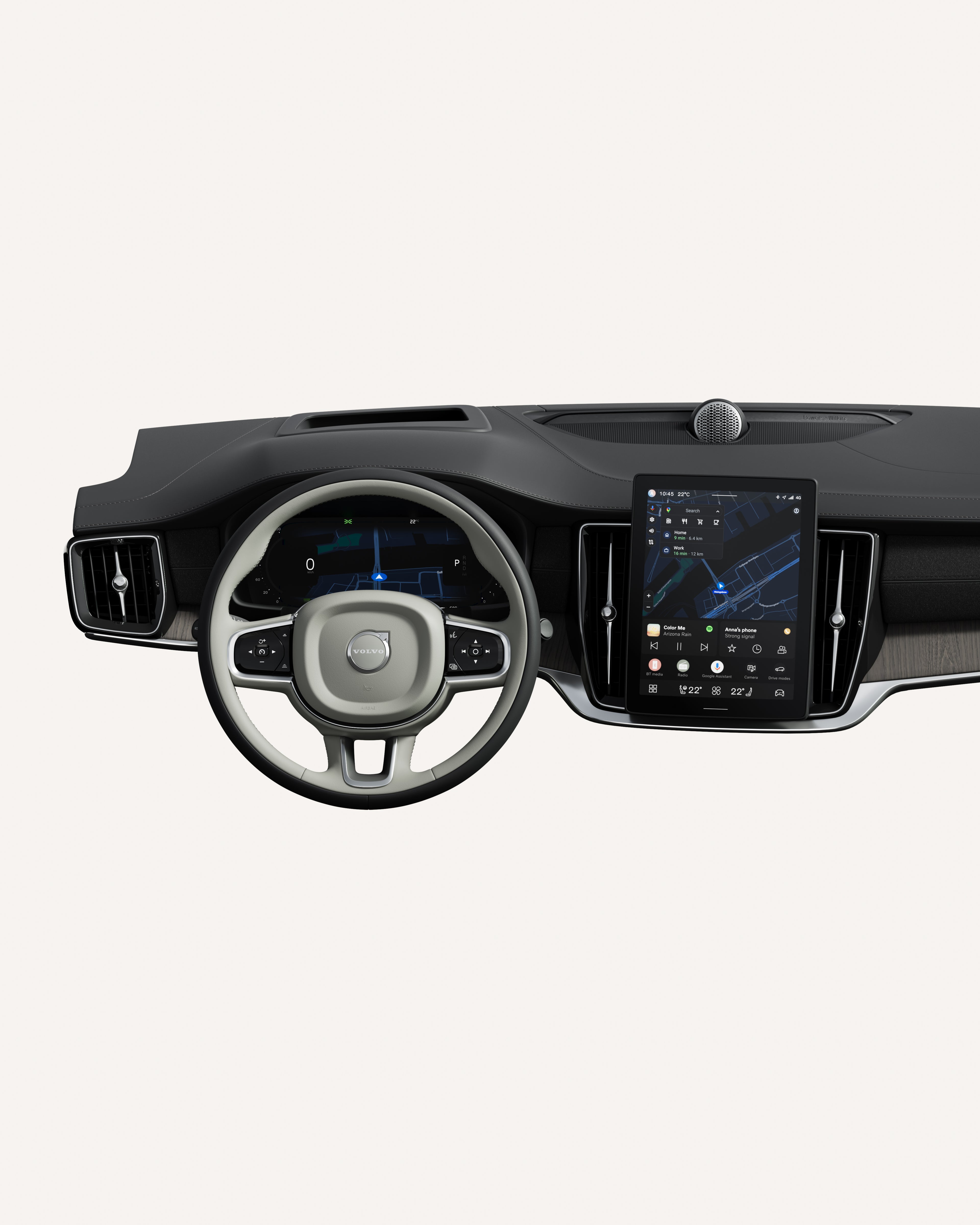 Interior view of the Volvo S90 dashboard, including steering wheel and touchscreen.