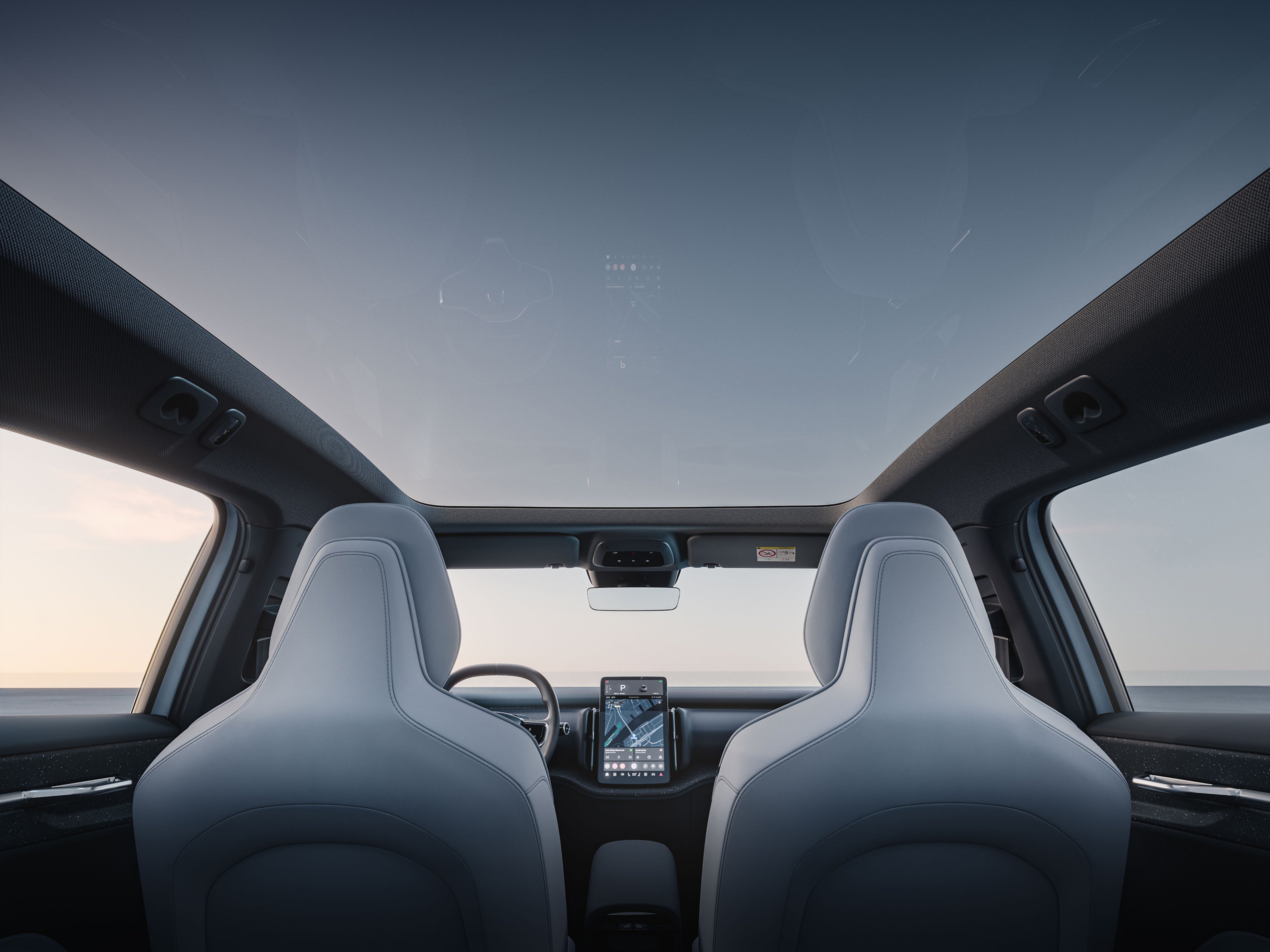 View from the rear seats of the Volvo EX30, showcasing the panoramic roof.