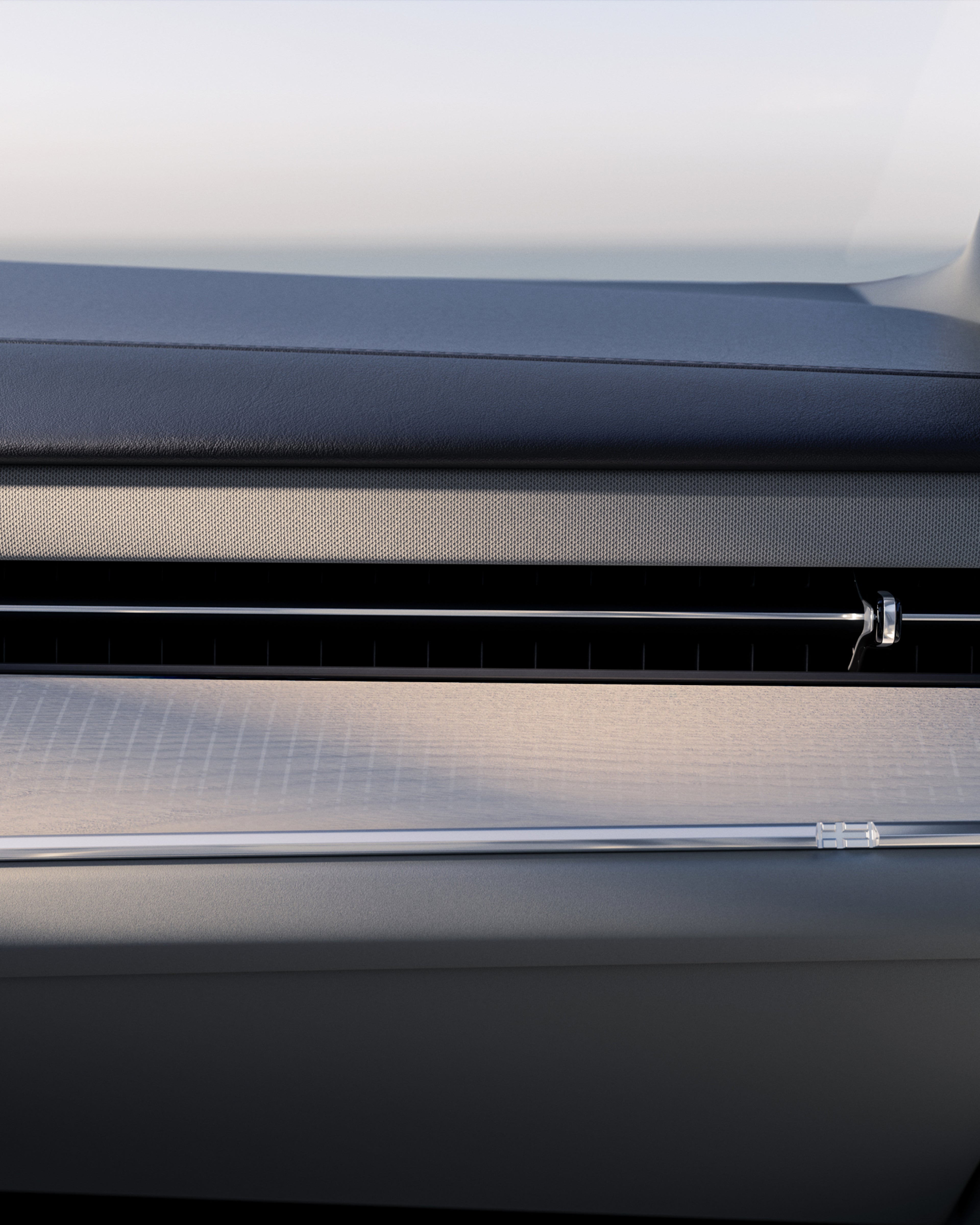 Nærbillede af Volvo ES90's instrumentbræt med minimalistisk design af luftventiler.