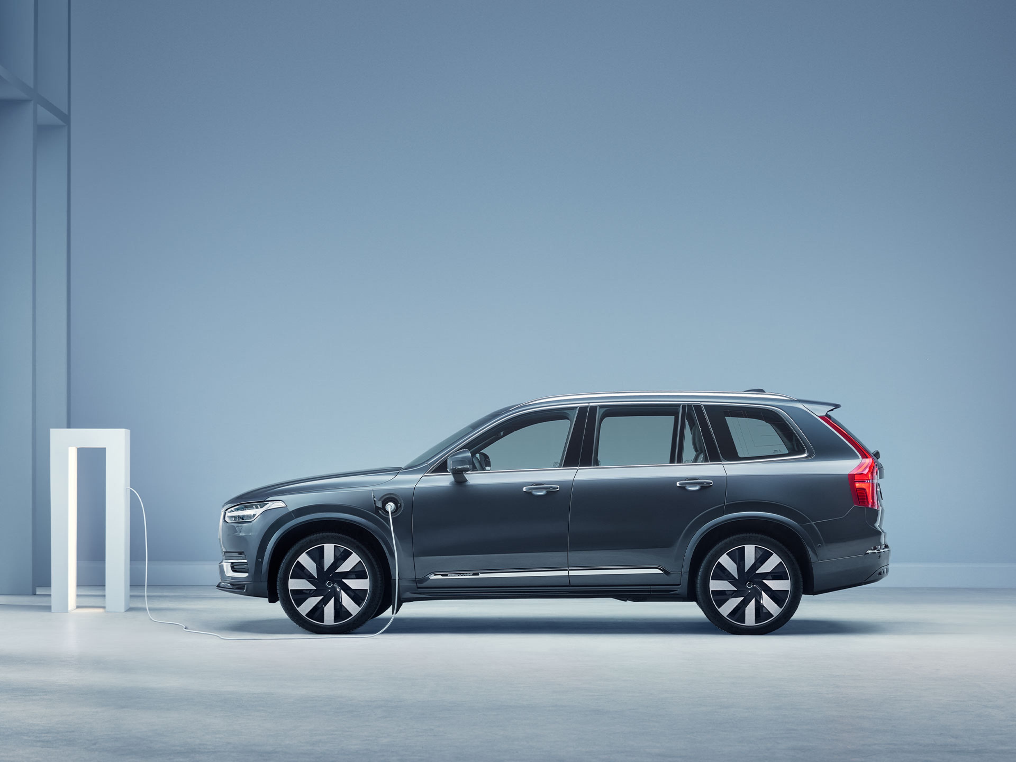 The side profile of a Volvo plug-in hybrid SUV.